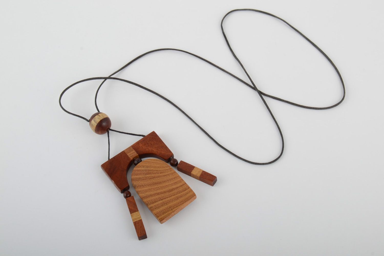 Handmade neck pendant carved of wood and decorated with volume inlay for women photo 4