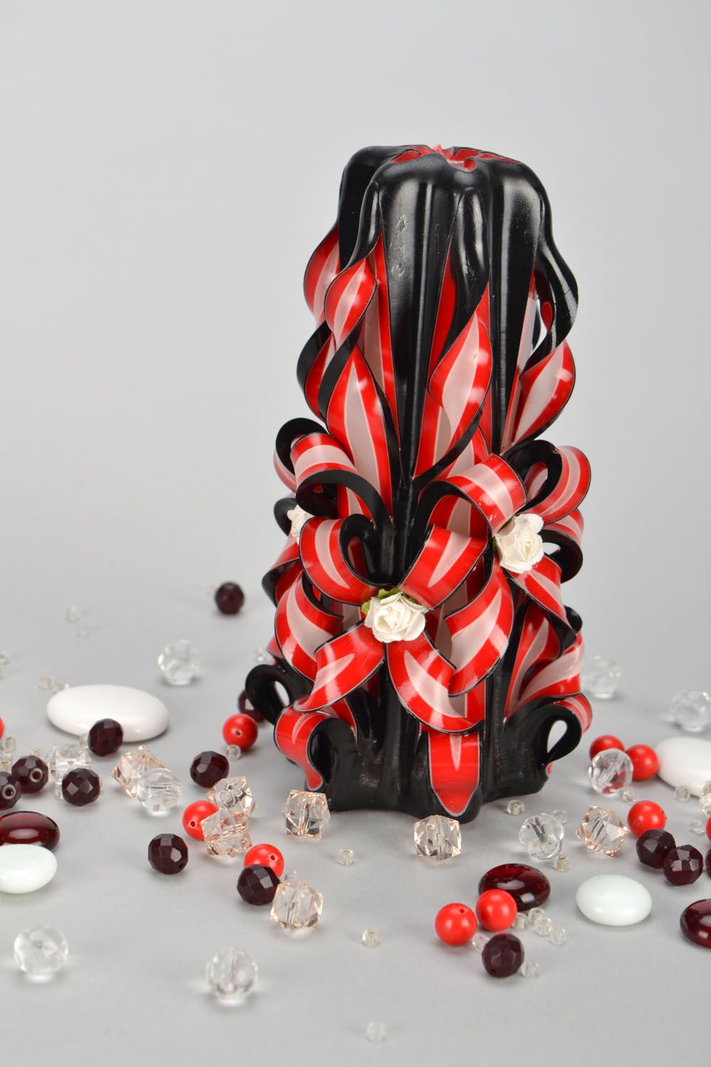 Black and red carved candle photo 1