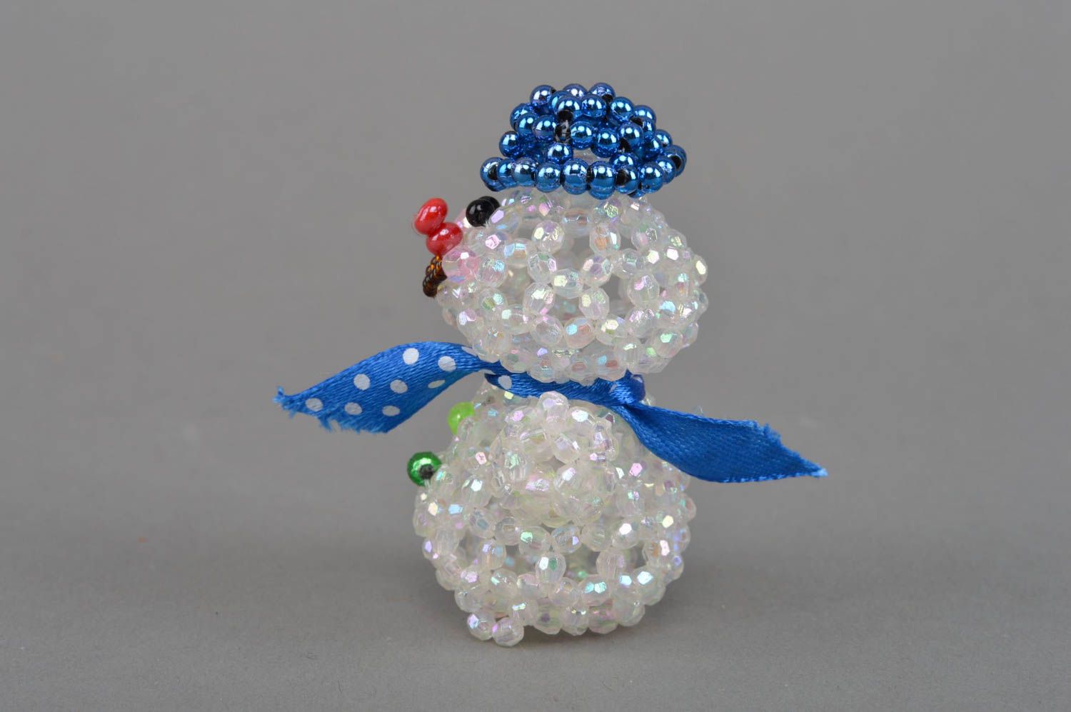 Handmade beautiful souvenir figurine woven of beads Snowman djay for home decor photo 2
