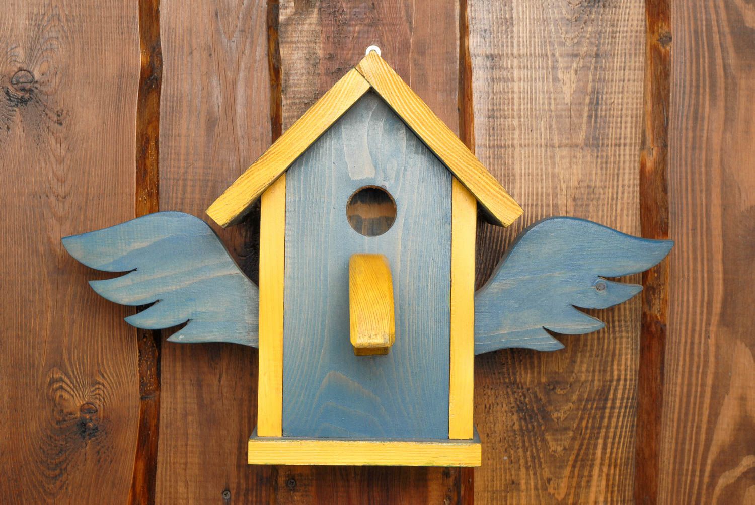 Wooden birdhouse painted with facade dyes photo 3