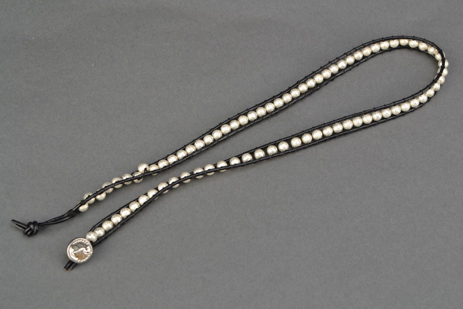 Multirow woven bracelet with metal beads photo 4