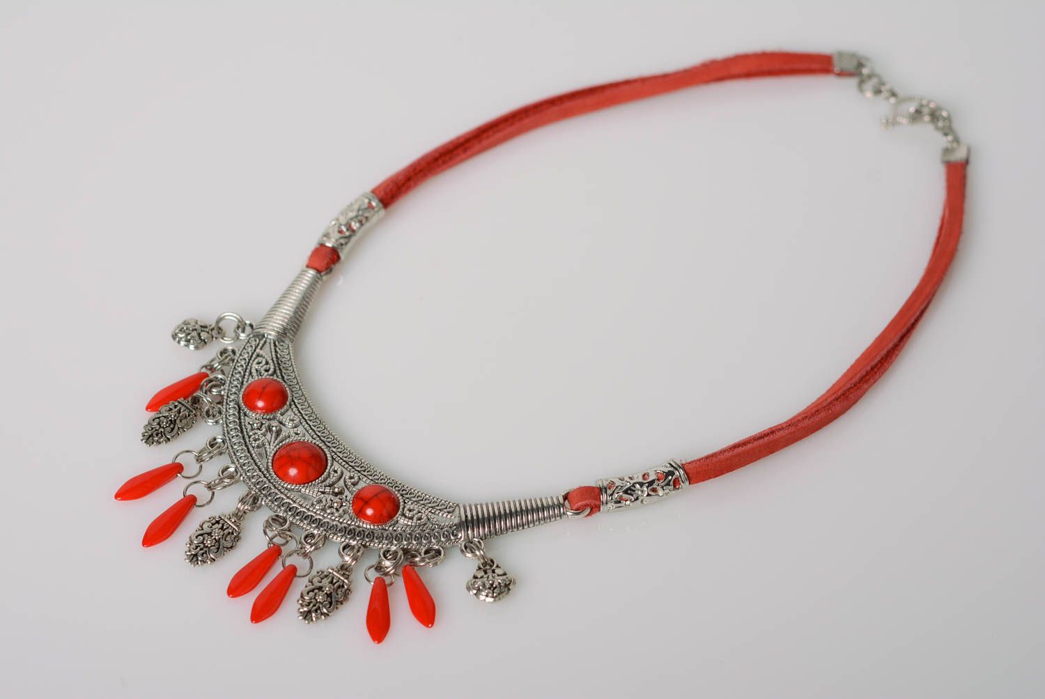 Beautiful designer evening necklace hand made of metal and leather of red color photo 1