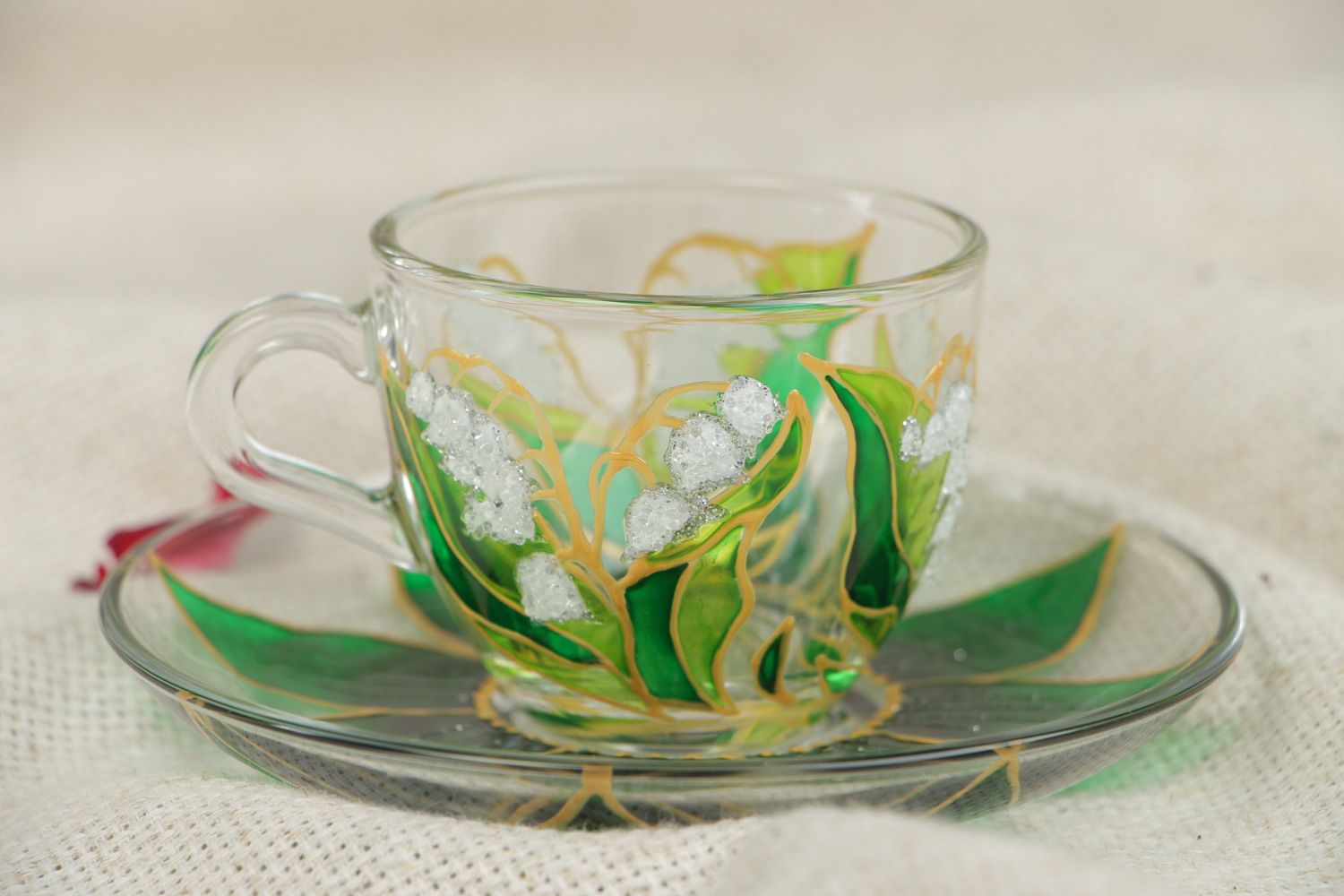 Unique clear glass teacup with hand-painted gold and green floral pattern photo 5