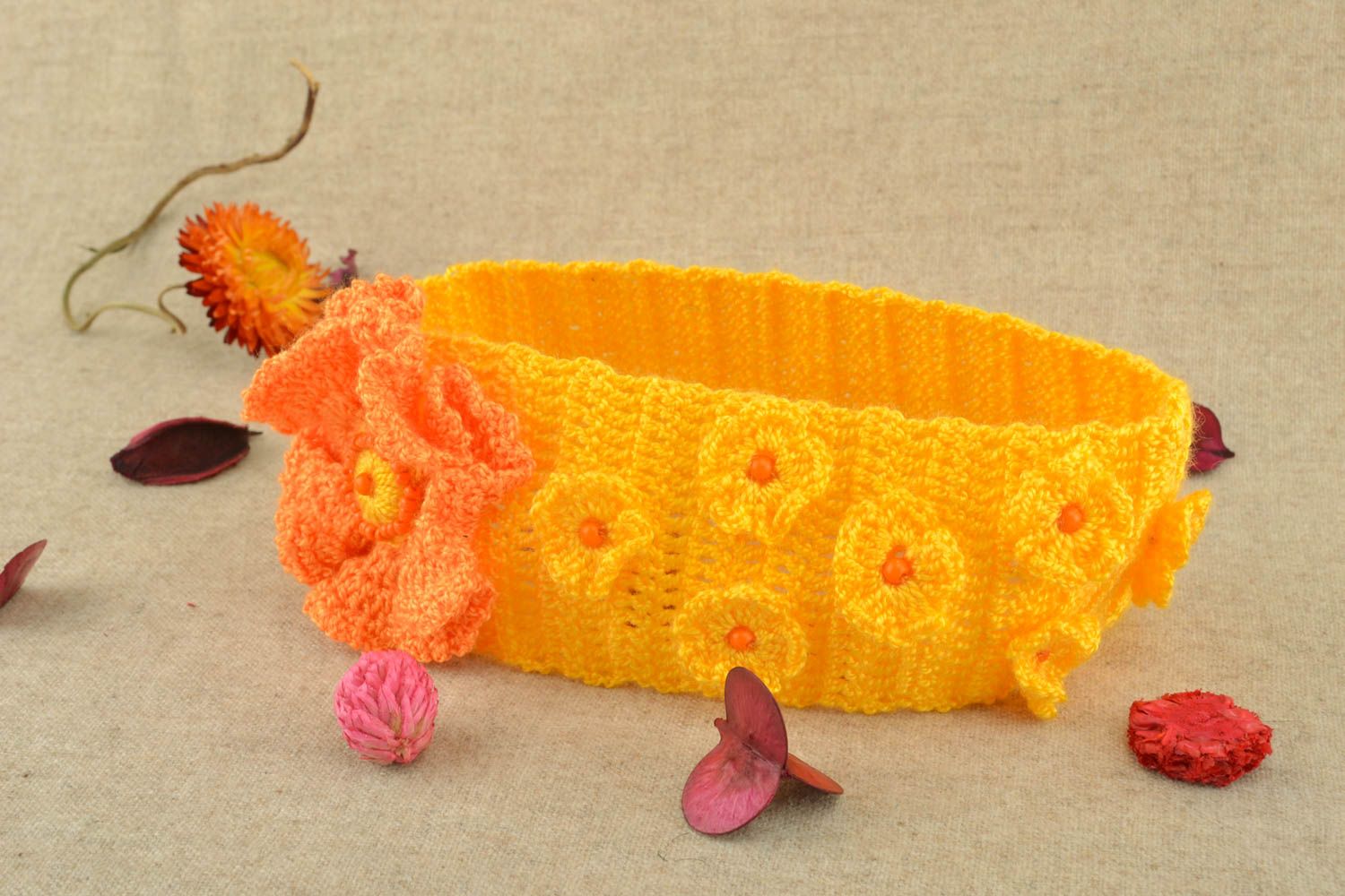 Bandeau à cheveux tricoté accessoire fait main orange avec fleur pour enfant photo 5