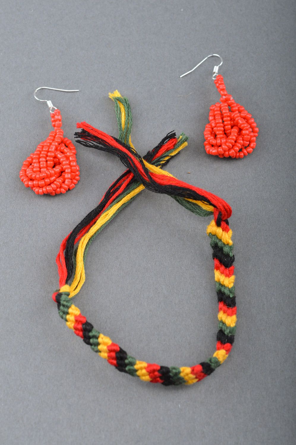 Set of handmade jewelry red beaded earrings and colorful friendship bracelet photo 2