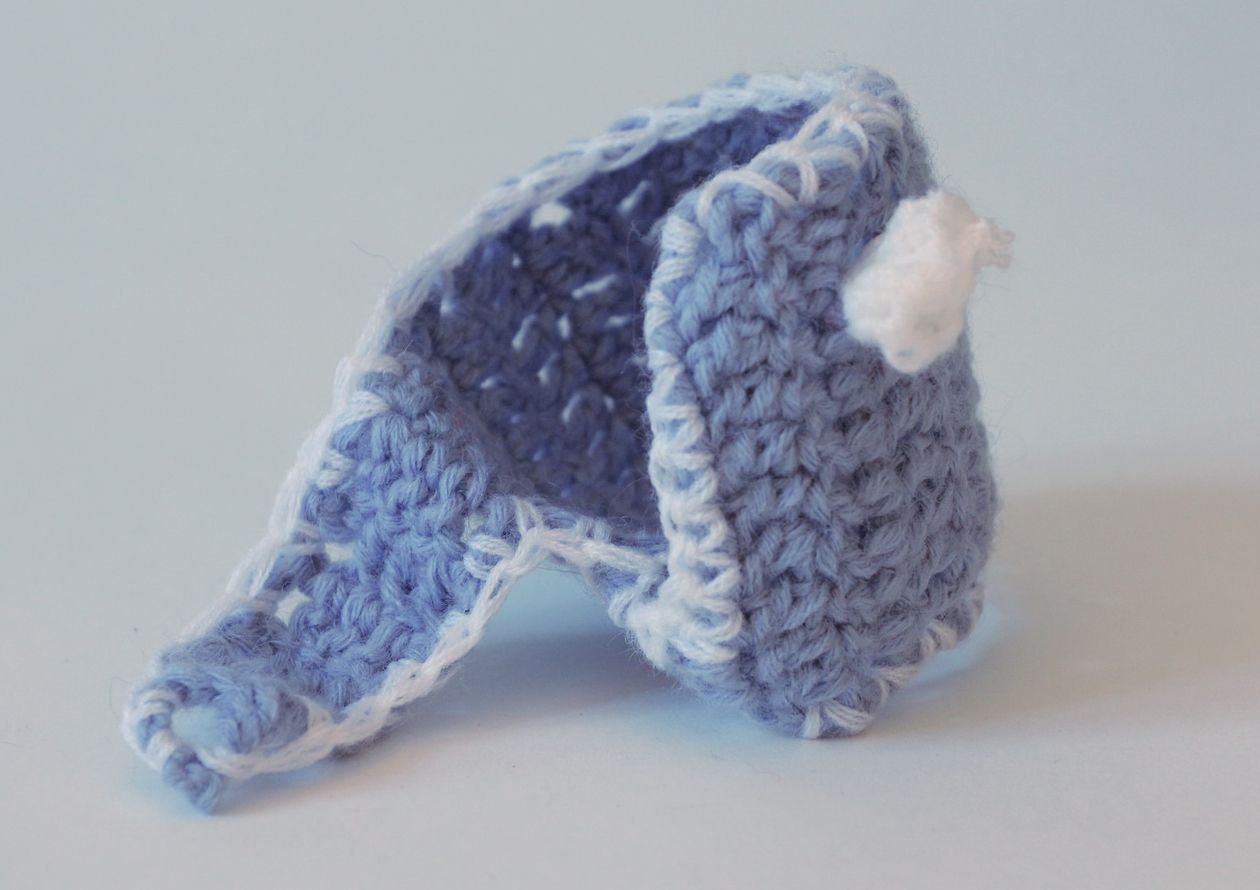 Blue knitted cup cozy photo 4
