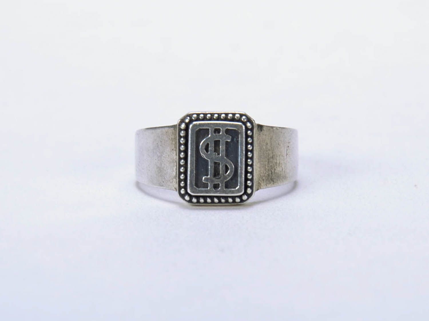 Silberner Ring mit Dollarzeichen foto 3