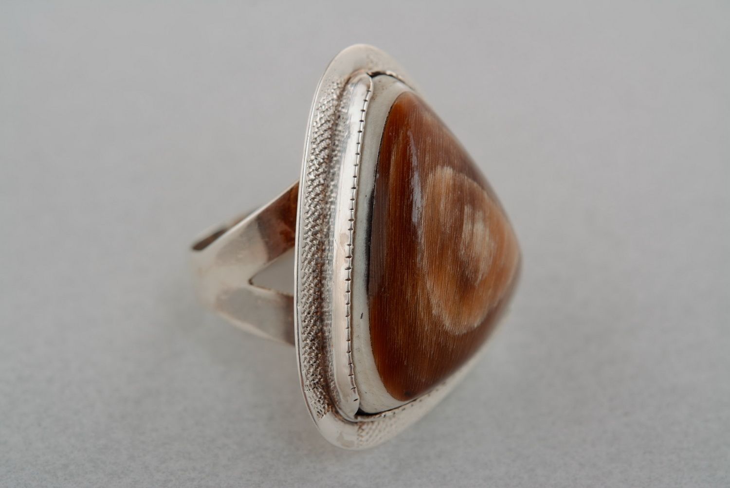 Silver ring with a cow horn photo 5