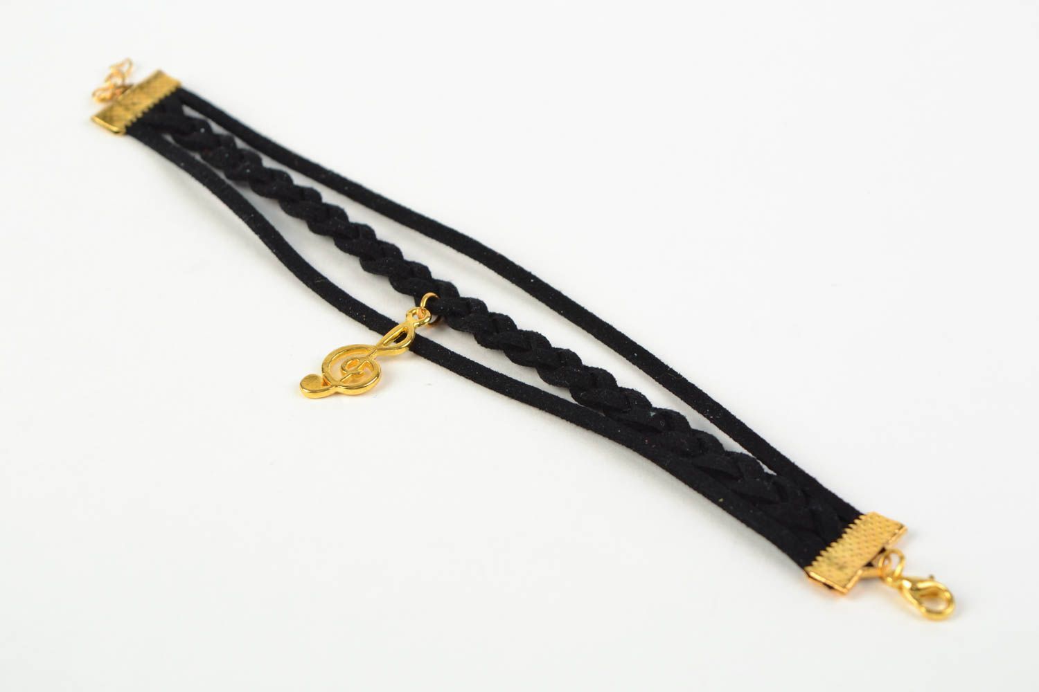 Pulsera artesanal de cordón de gamuza con clave de sol de color negro foto 4