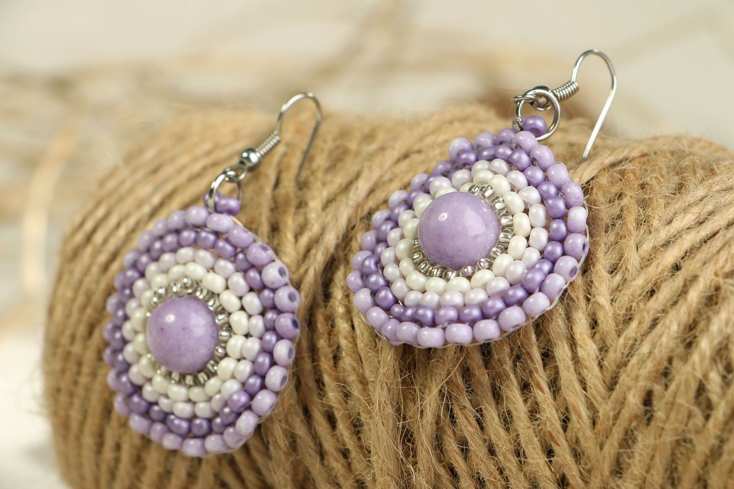 Round earrings with charoity photo 2