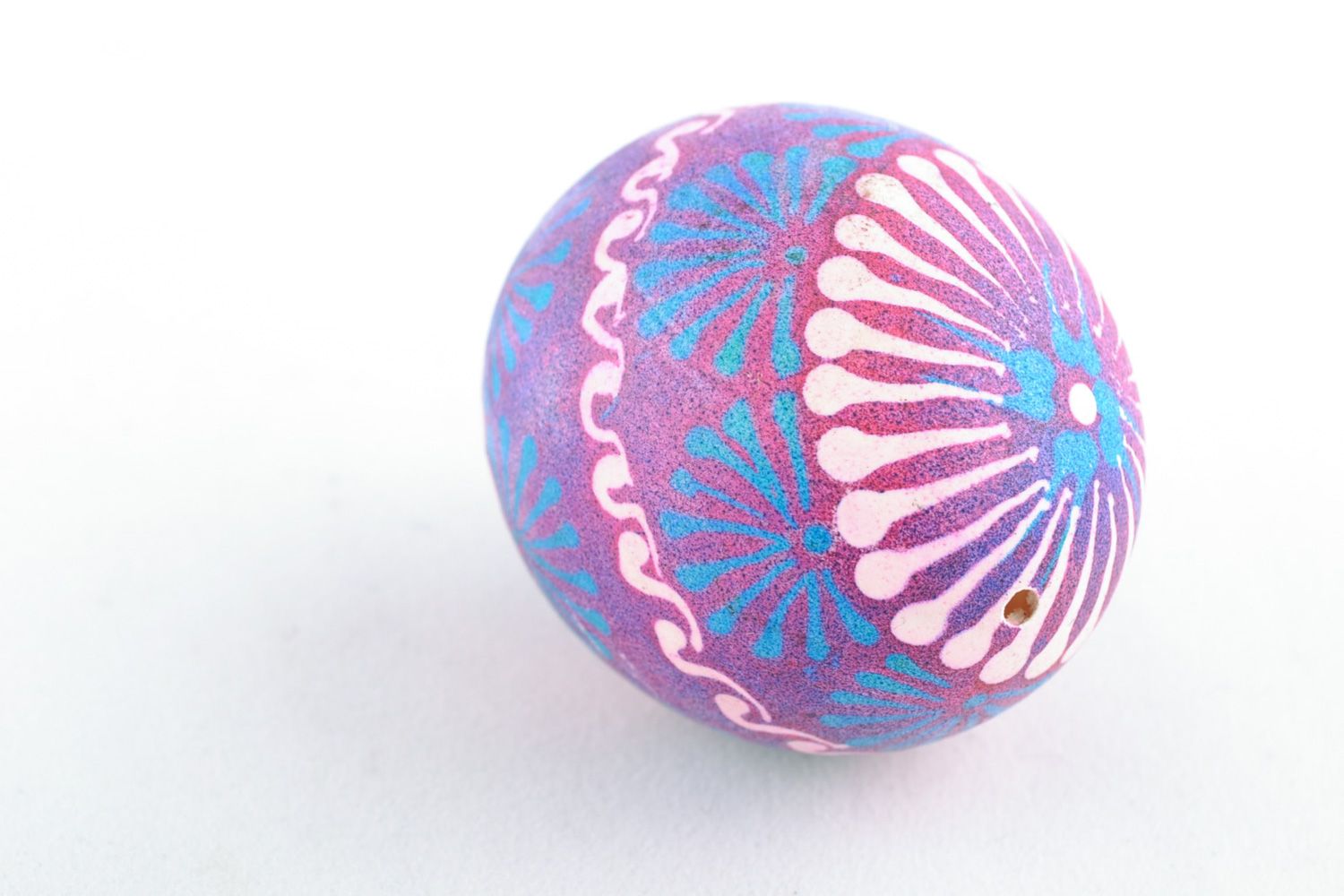 Handmade Easter egg painted with wax in Lemkiv style in blue and violet colors photo 3
