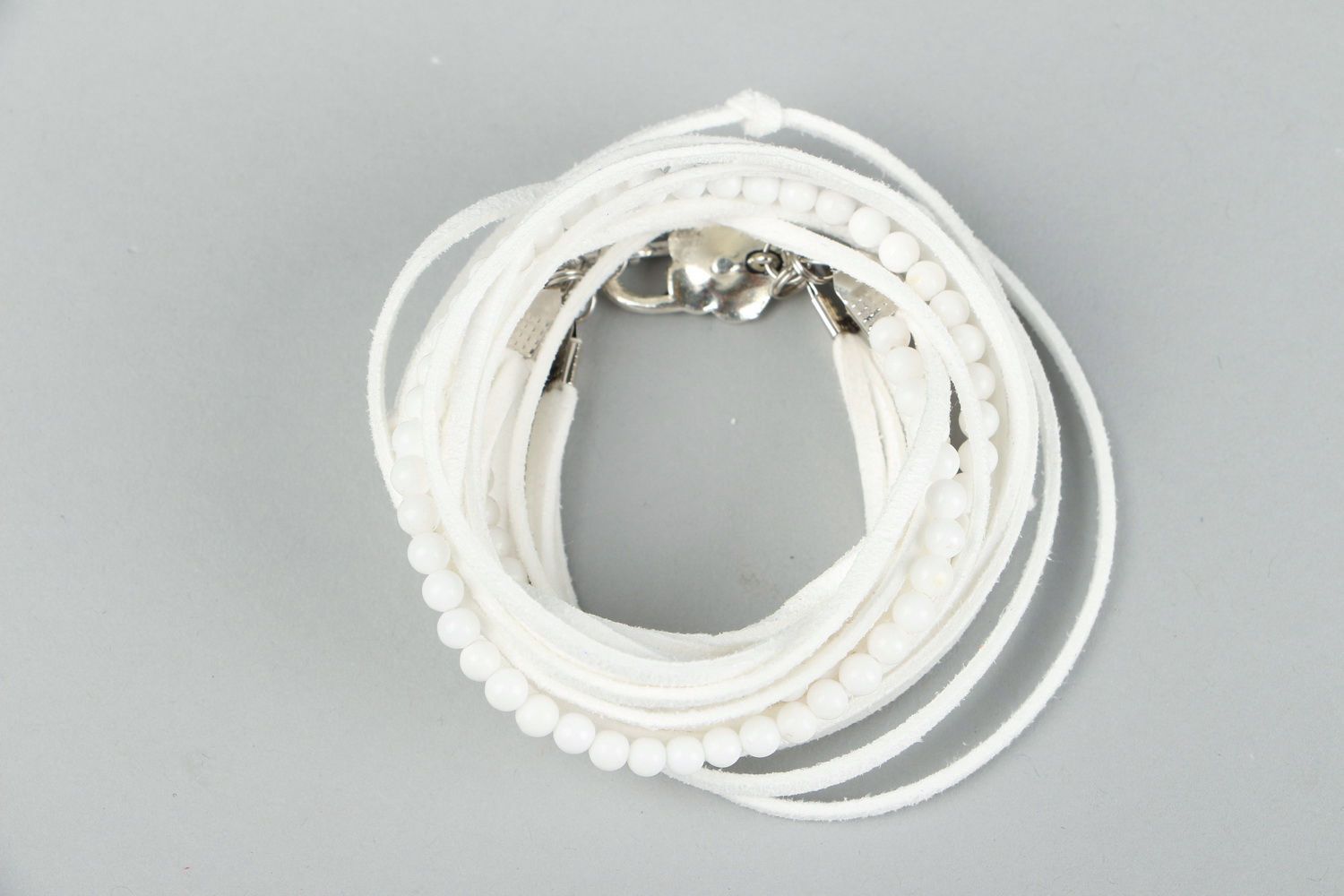 White suede bracelet for attraction of love photo 2