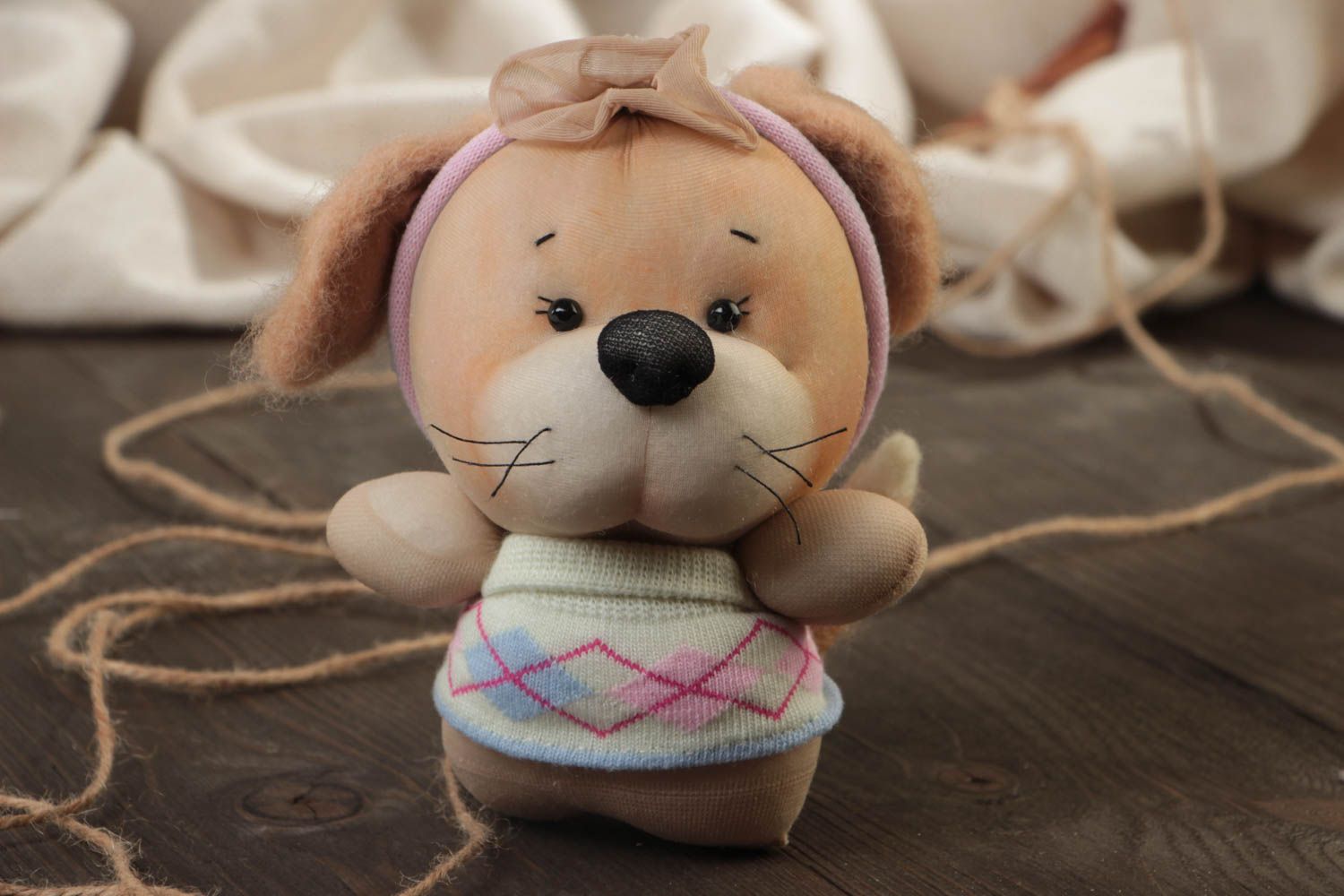 Handmade designer nylon soft toy in the shape of a dog with woolen threads photo 1