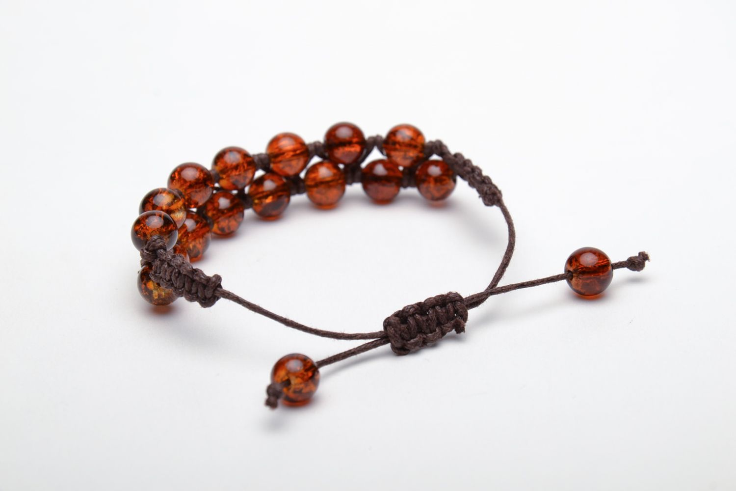 Wrist bracelet made of amber-like beads photo 4
