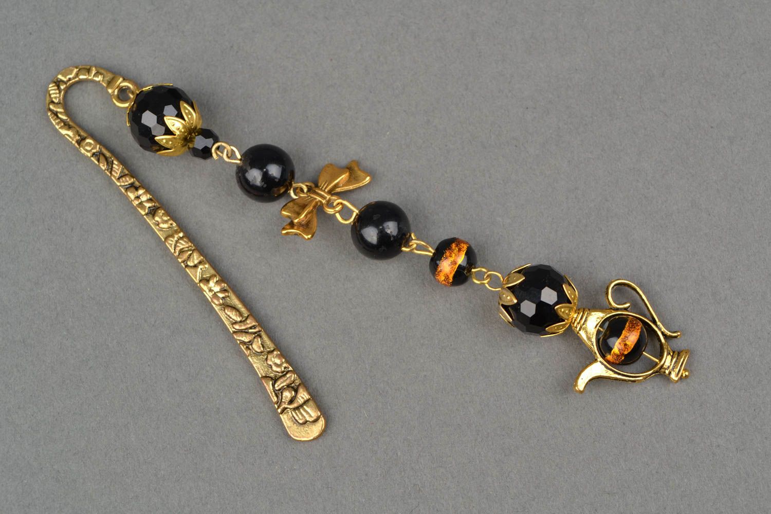 Golden-like bookmark with black beads photo 4