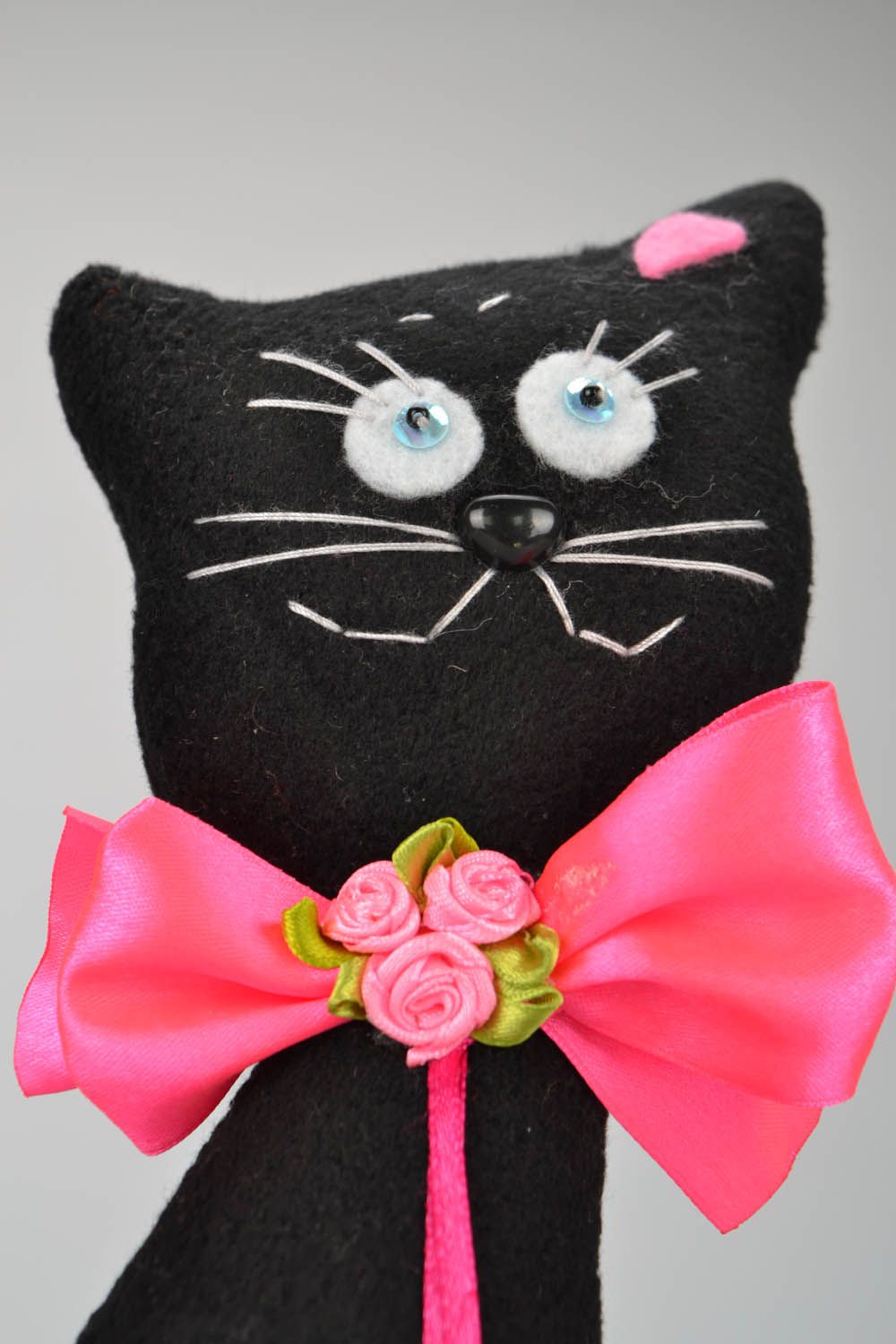 Handmade soft toy in the shape of a cat photo 1