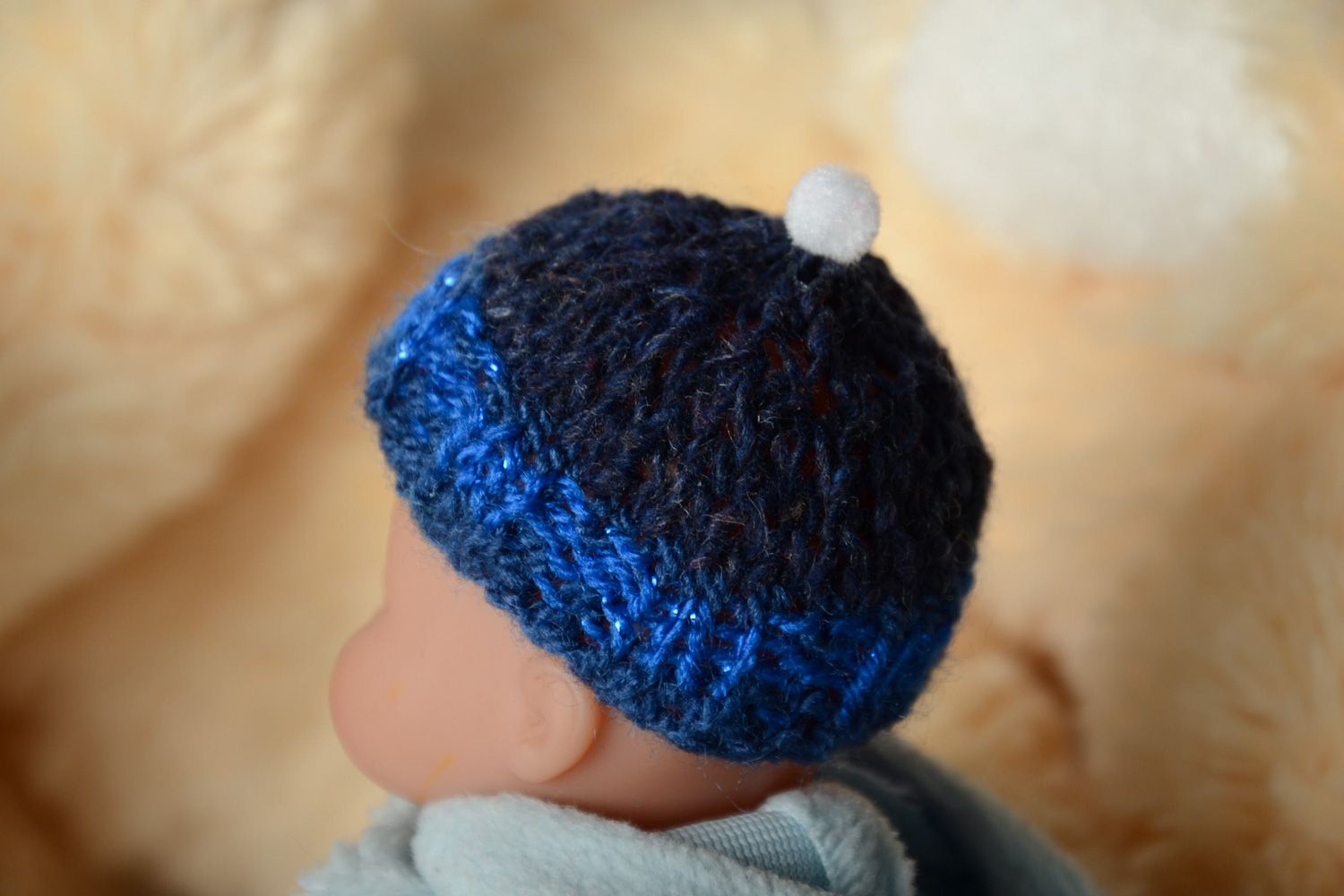 Knitted dark blue hat for a baby toy. Two inches in diameter photo 1