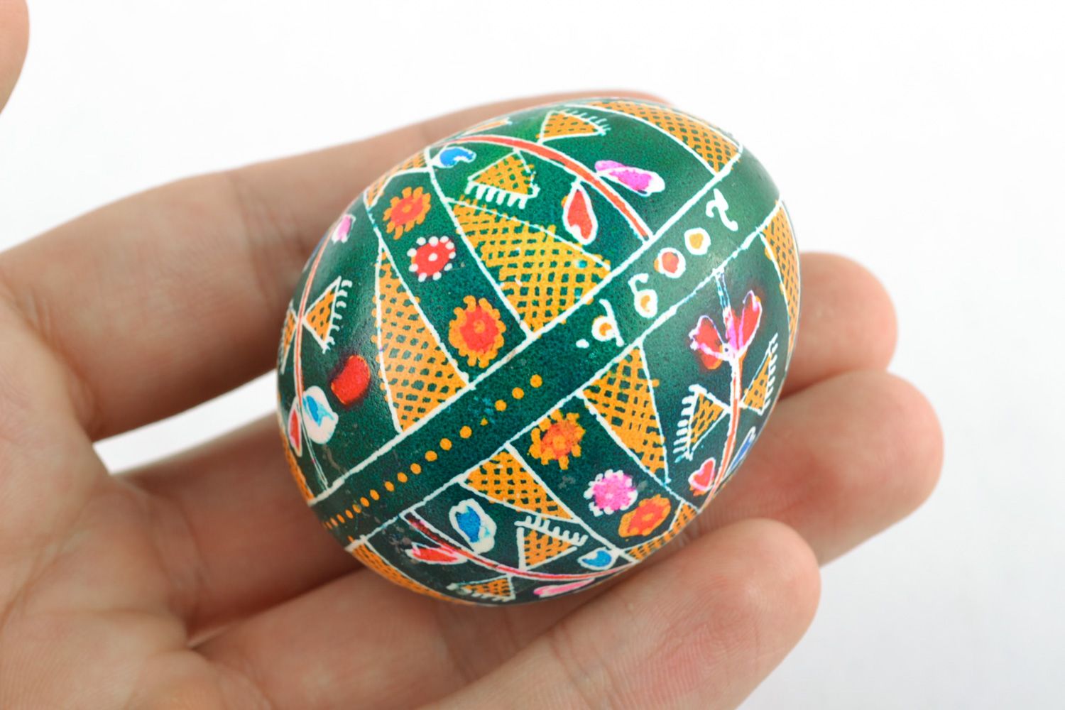 Homemade green Easter egg painted with hot wax photo 2