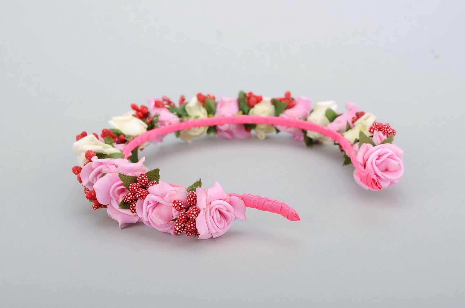 Headband with pink artificial flowers photo 2