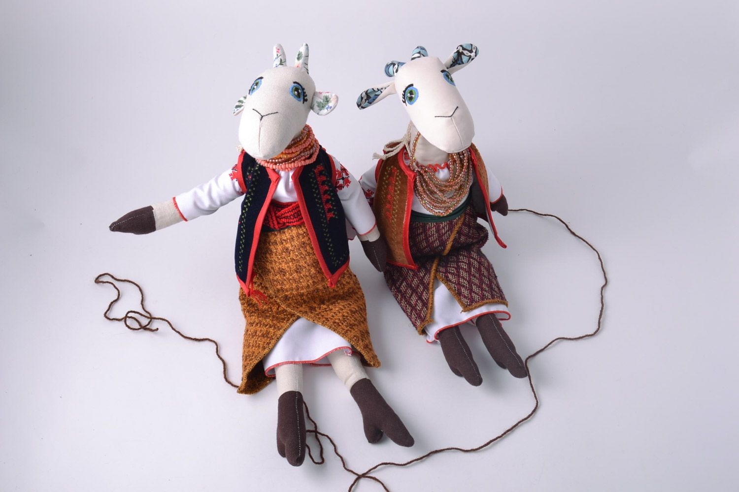 Set of 2 handmade interior fabric soft toys goats in ethnic Ukrainian clothes photo 1