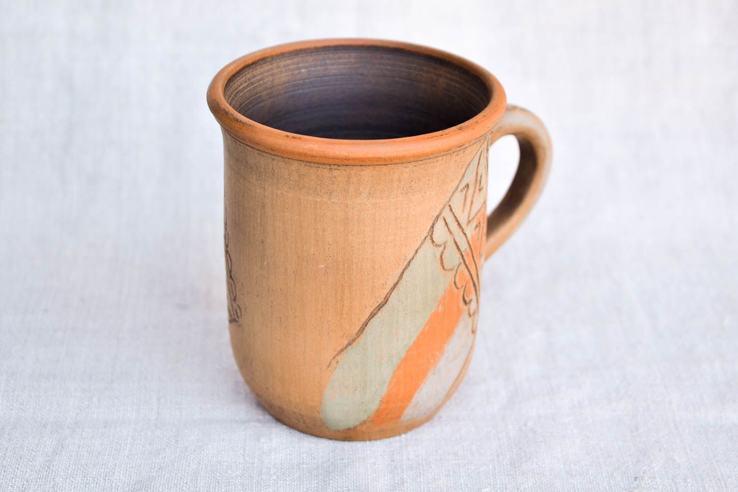 Tall drinking mug in brown, orange, and olive colors photo 3
