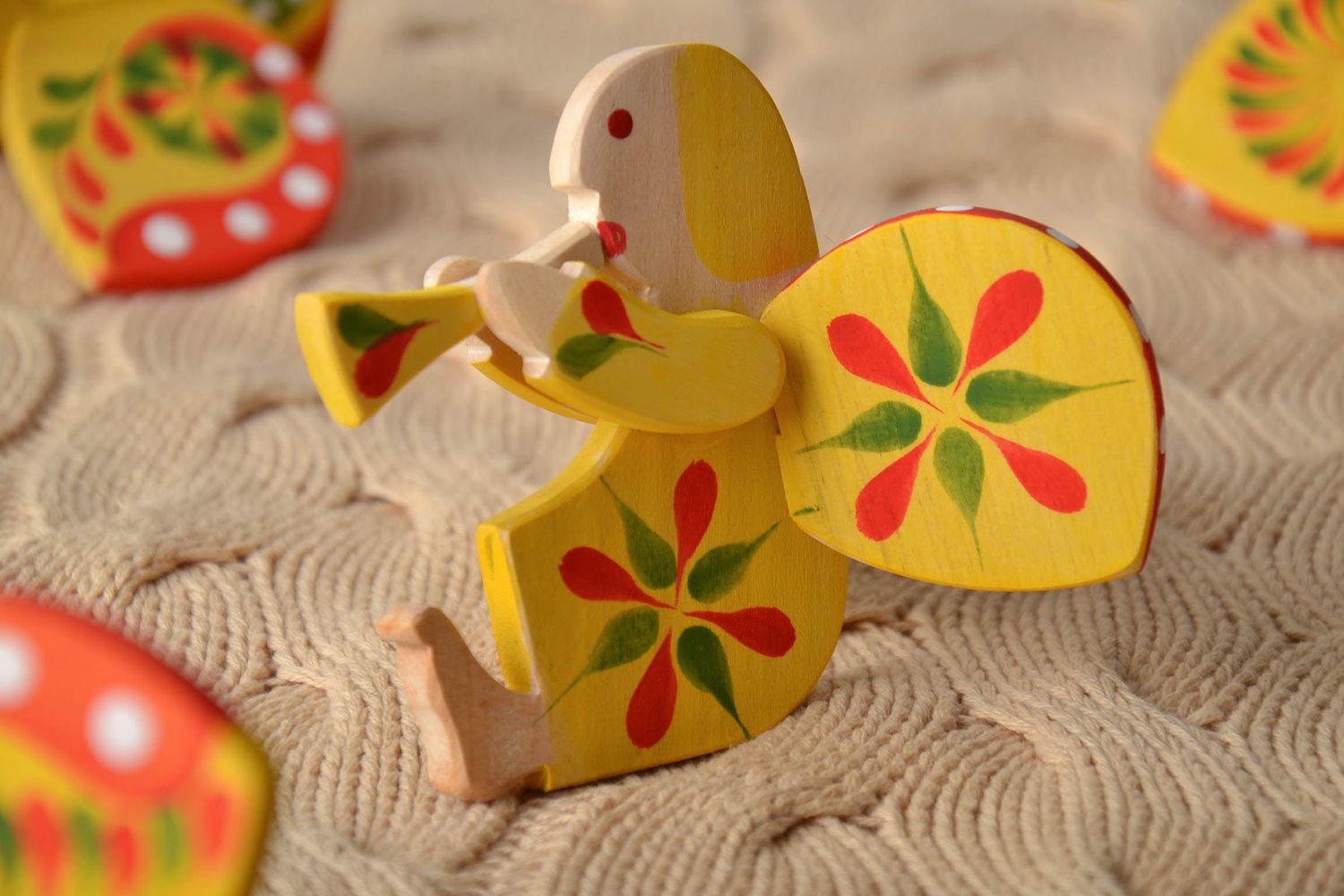 Homemade wooden toy with ethnic painting Angel with Flute photo 1