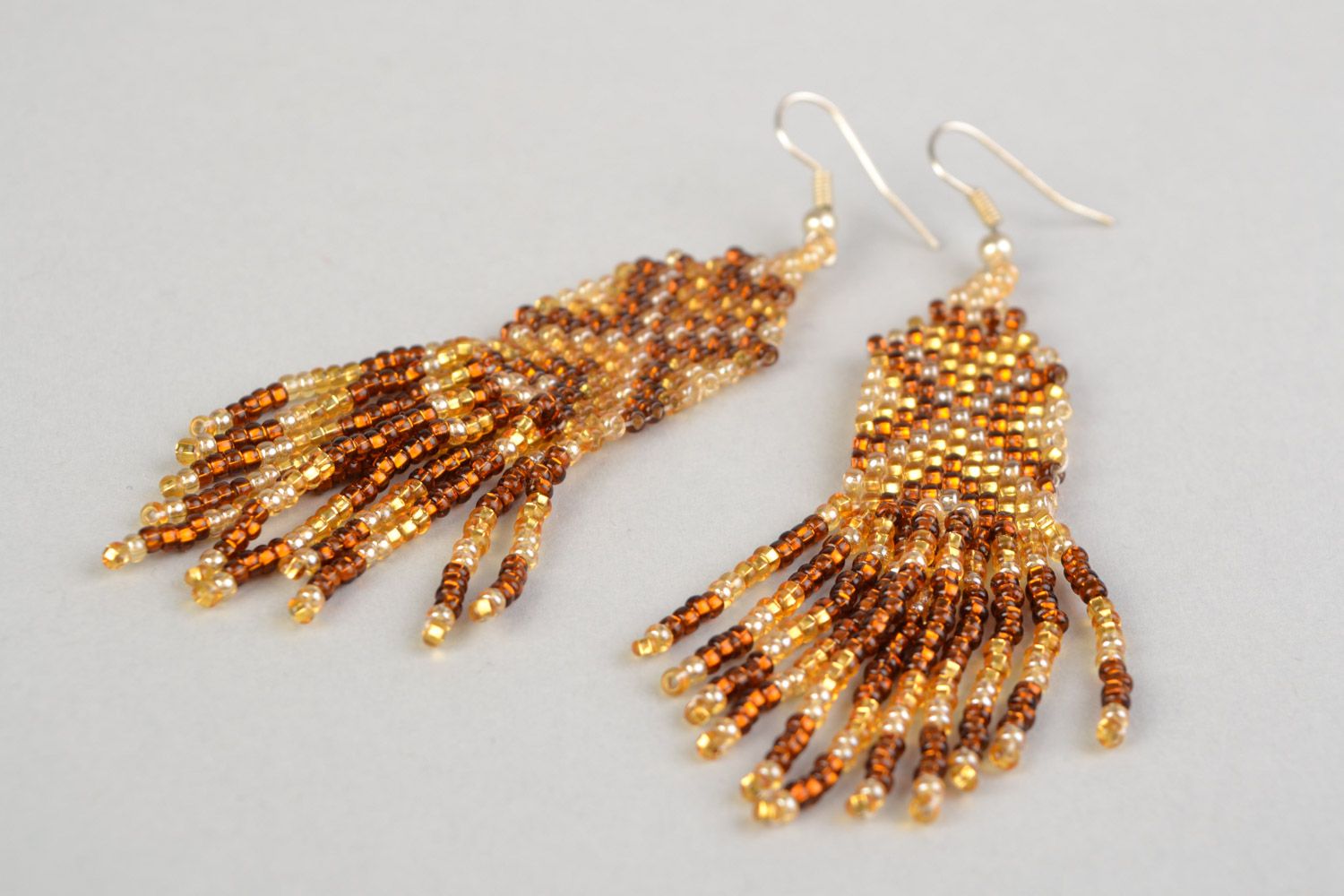 Handmade beaded dangling earrings with long fringe in brown color palette  photo 4