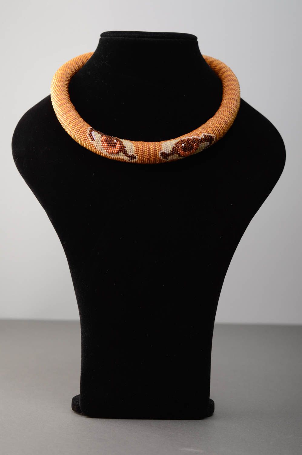 Beaded cord necklace with animal motives photo 2