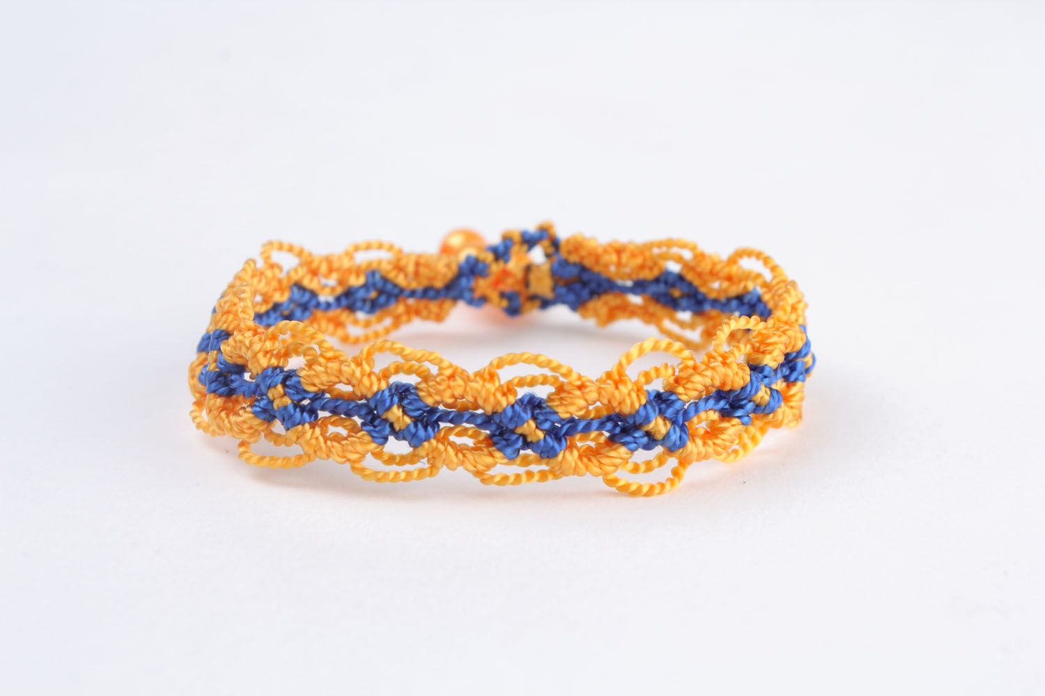 Желто-синий плетеный браслет  фото 3