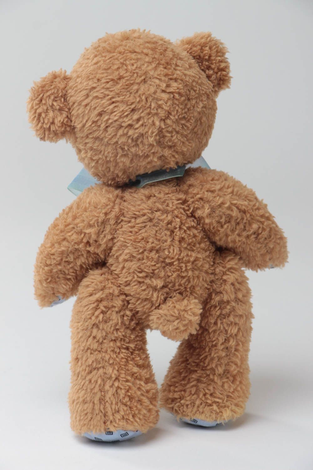 Handmade designer soft toy beige bear with blue bow for children photo 4