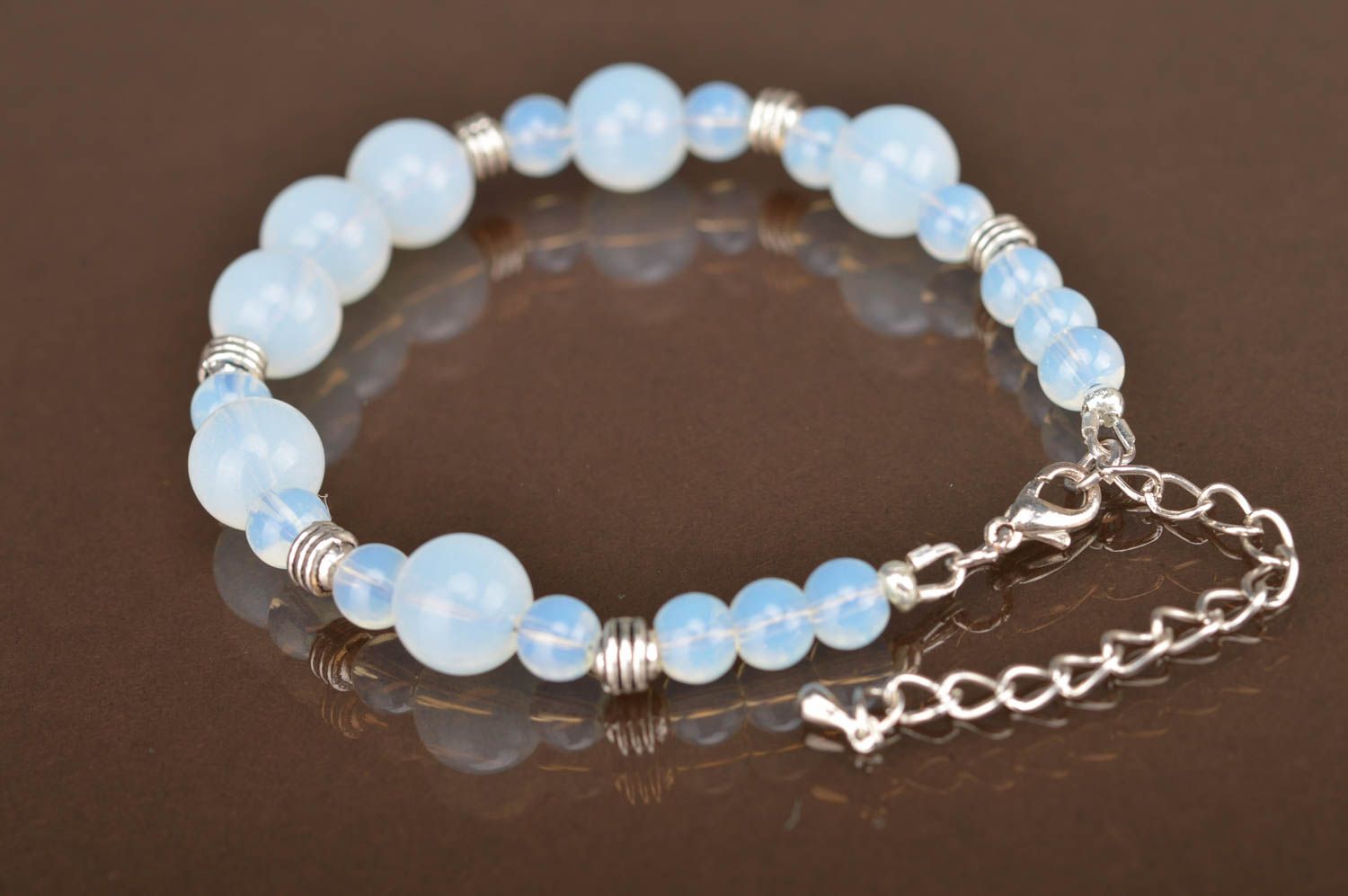 Beautiful women's handmade designer glass bead bracelet of gentle blue color photo 4