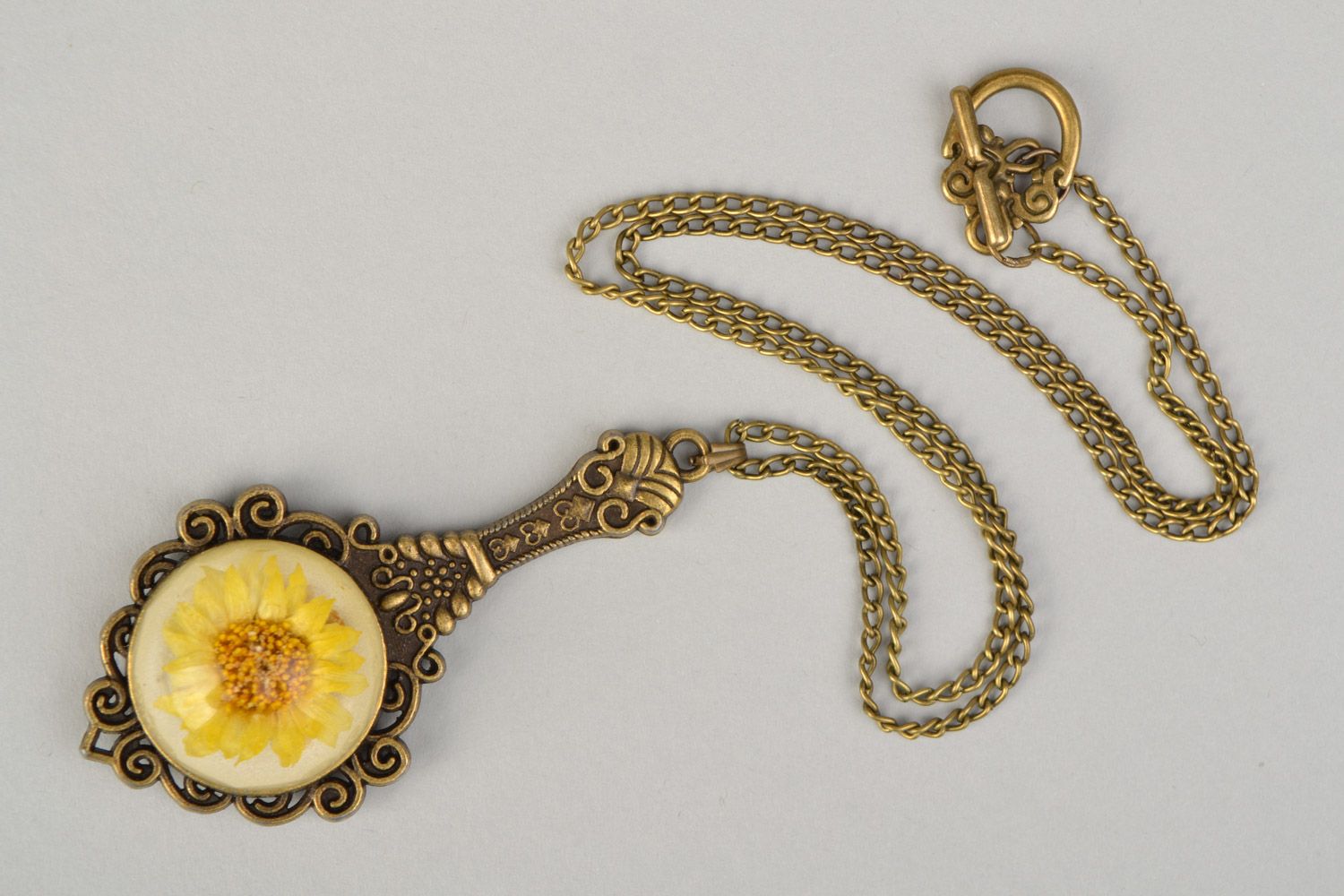 Handmade vintage pendant with chrysanthemum flower is epoxy resin on chain  photo 3