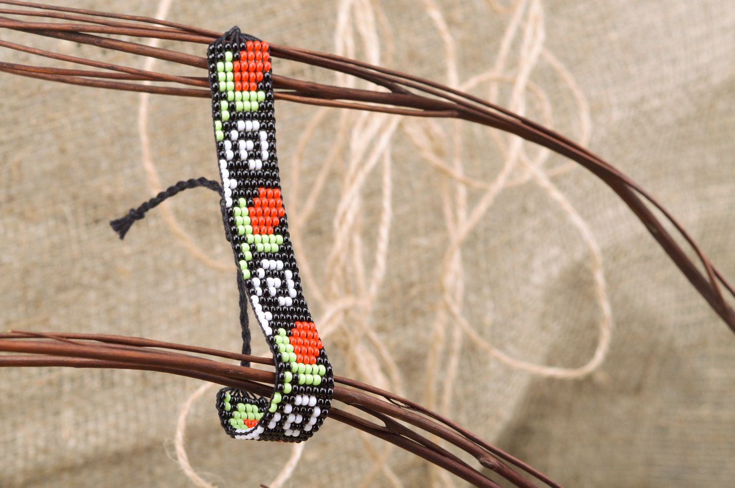 Unusual handmade woven bead bracelet black with red flowers photo 1