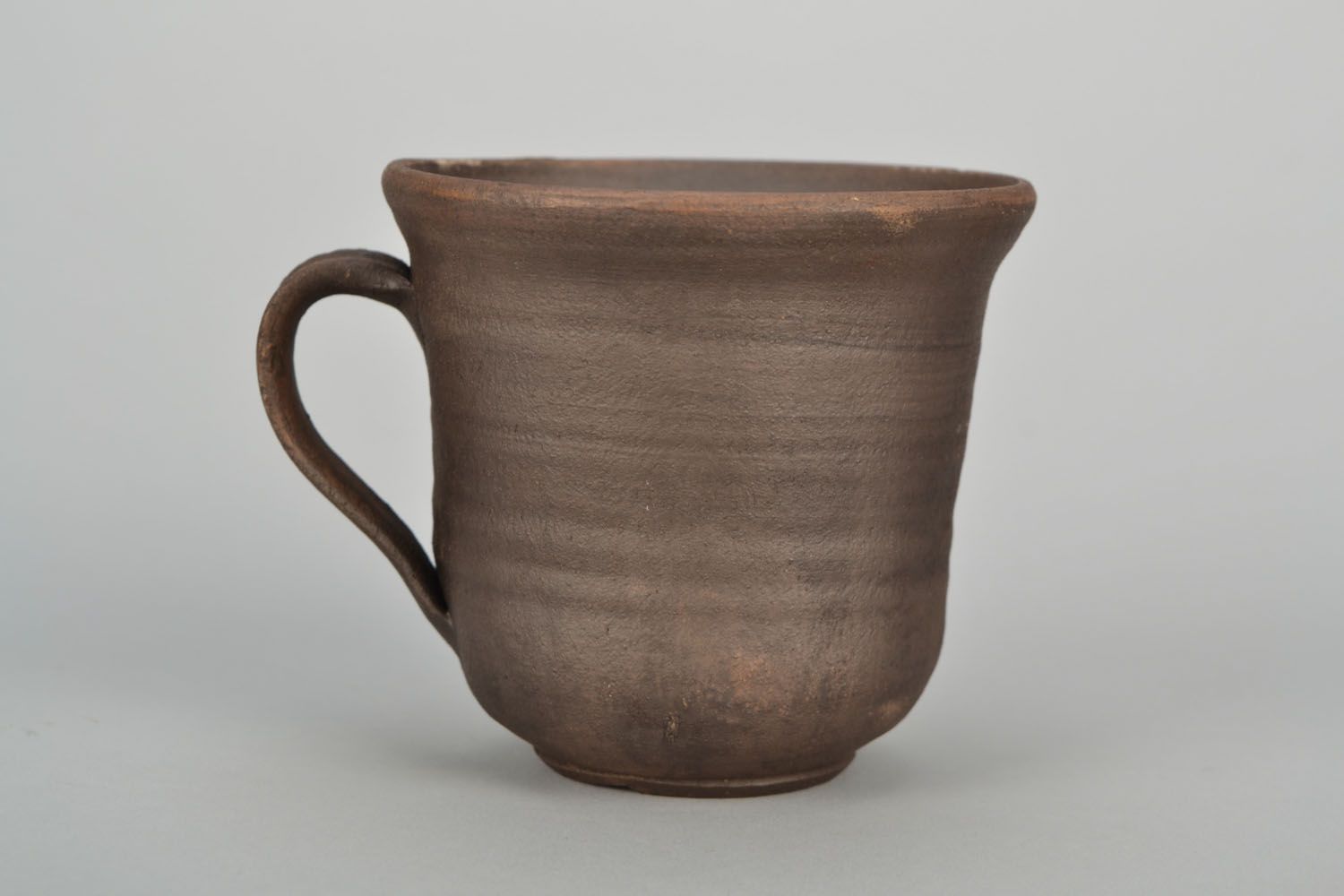 5 oz brown clay cup with handle and no pattern photo 3