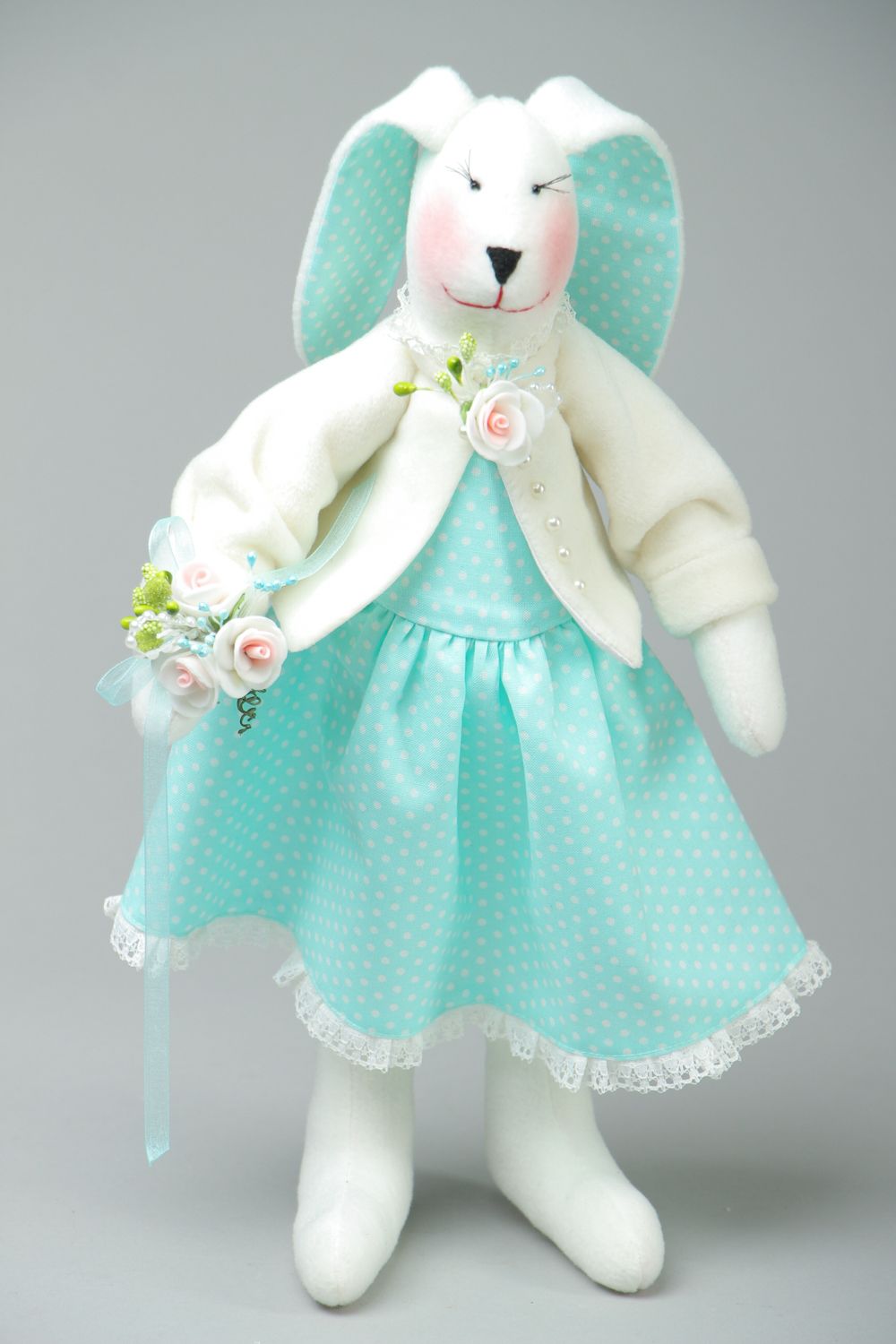 Beautiful toy rabbit with long ears photo 1