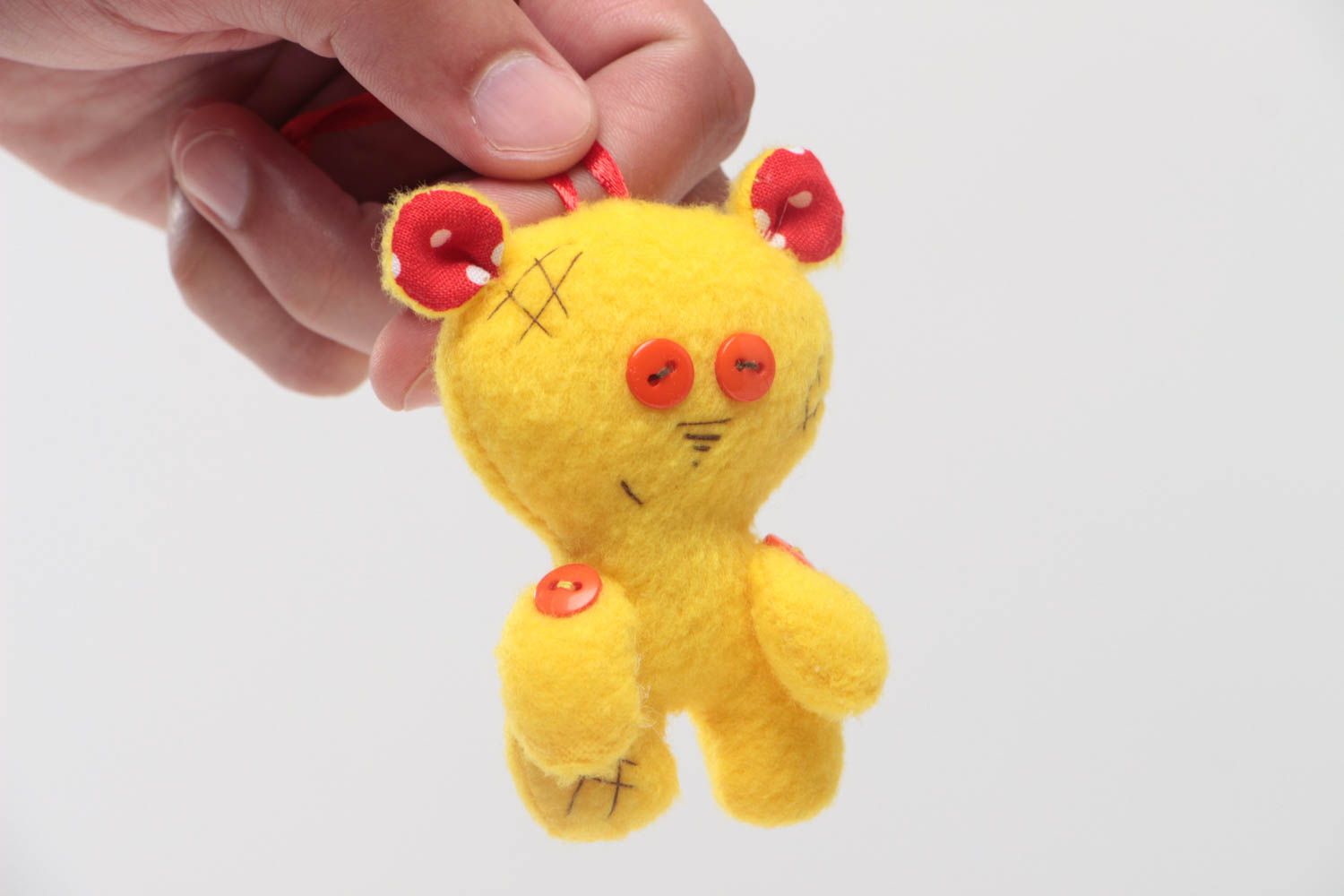 Handmade tiny soft toy sewn of fleece and cotton yellow bear with eyelet photo 5