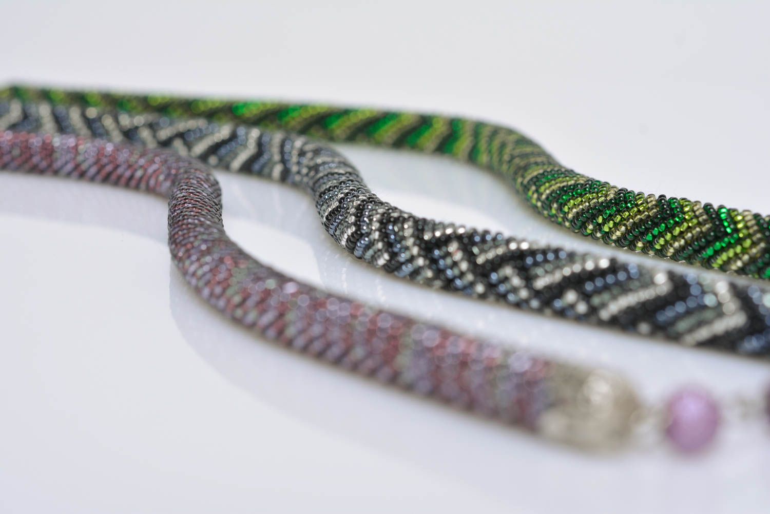Handmade designer bead woven cord necklace with laconic dark geometric ornament photo 2