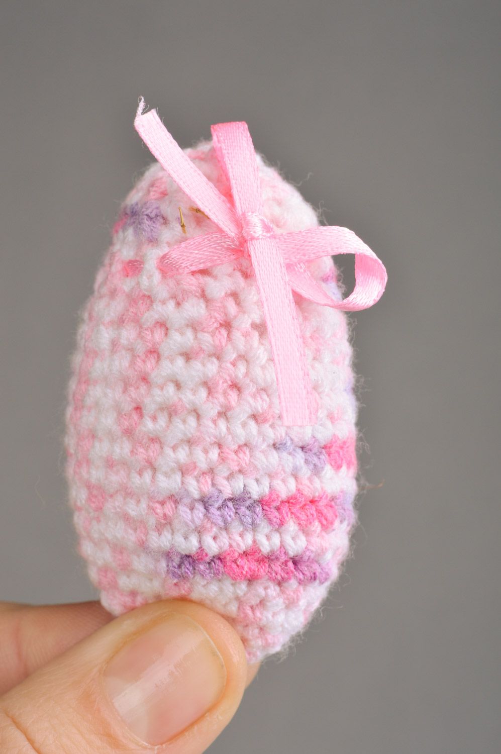 Handmade decorative soft Easter egg crocheted of pink threads with bow photo 3