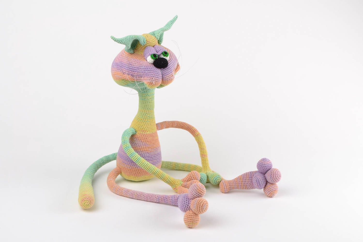 Handmade designer soft toy crocheted of acrylic threads cat of rainbow coloring photo 3