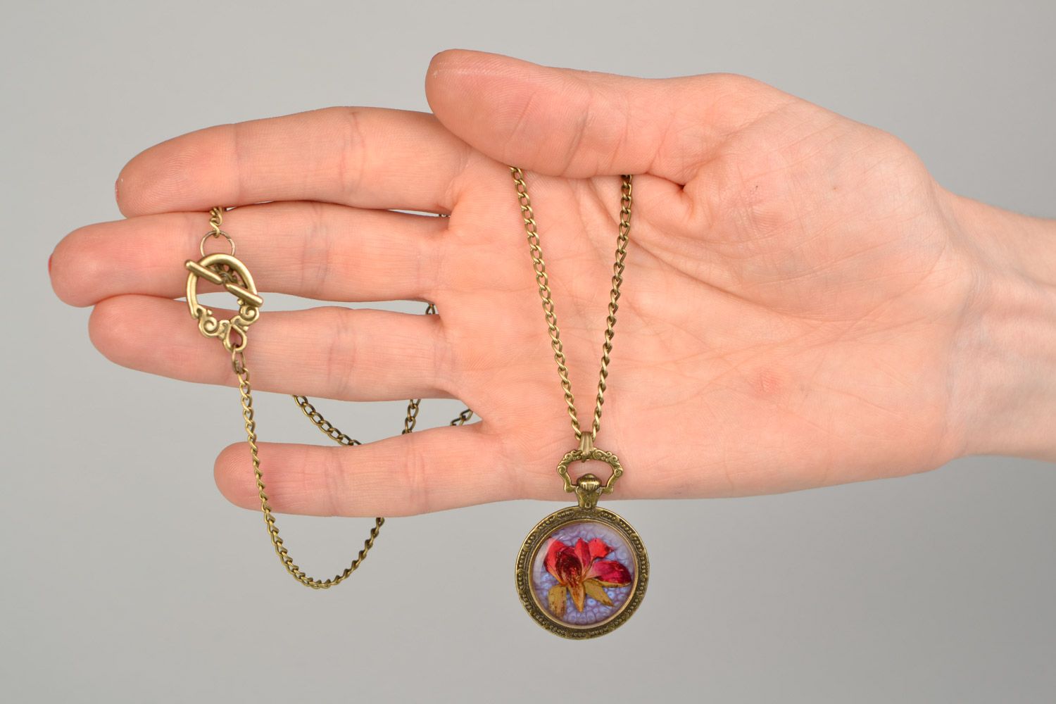 Set of handmade designer botanical pendants with real flowers coated with epoxy 2 items photo 4