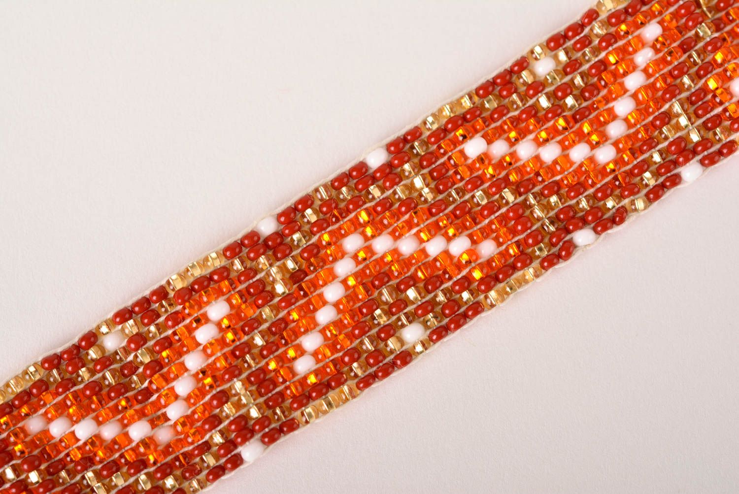 Bright orange and red beads strand bracelet for women photo 3