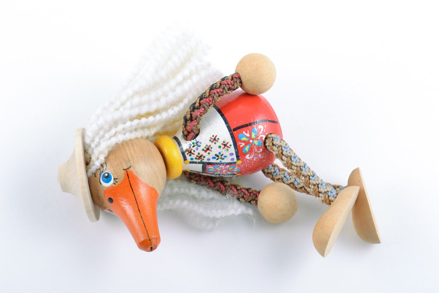 Handmade wooden toy in the shape of duck painted with eco dyes for children photo 5