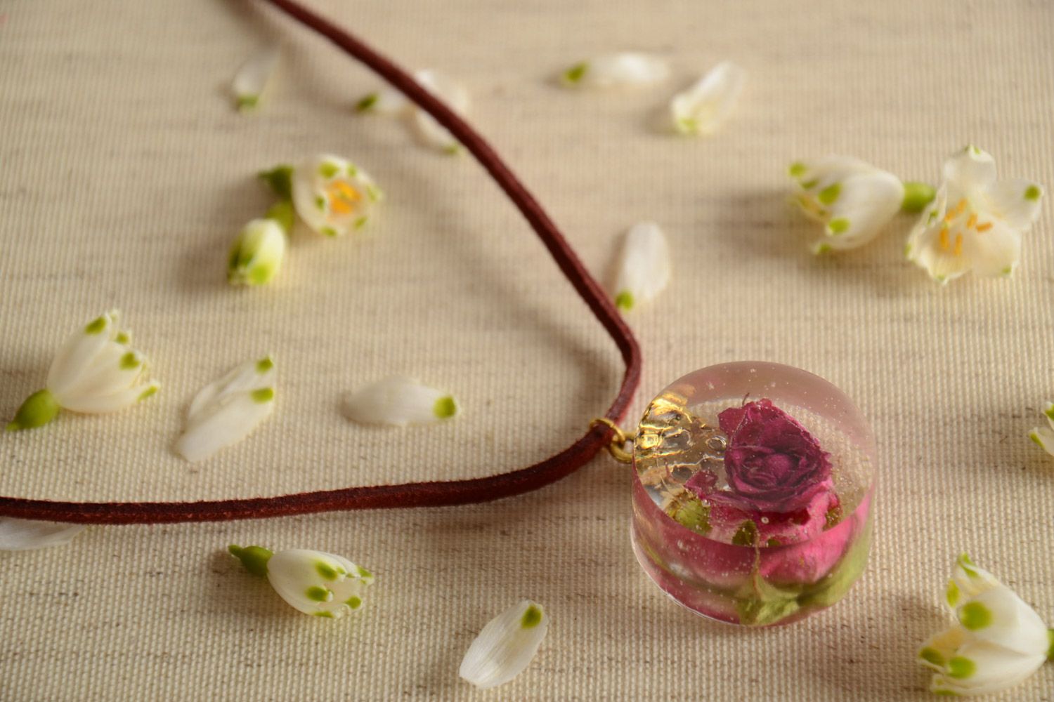 Beautiful handmade pendant on suede cord with real flowers coated with epoxy photo 1