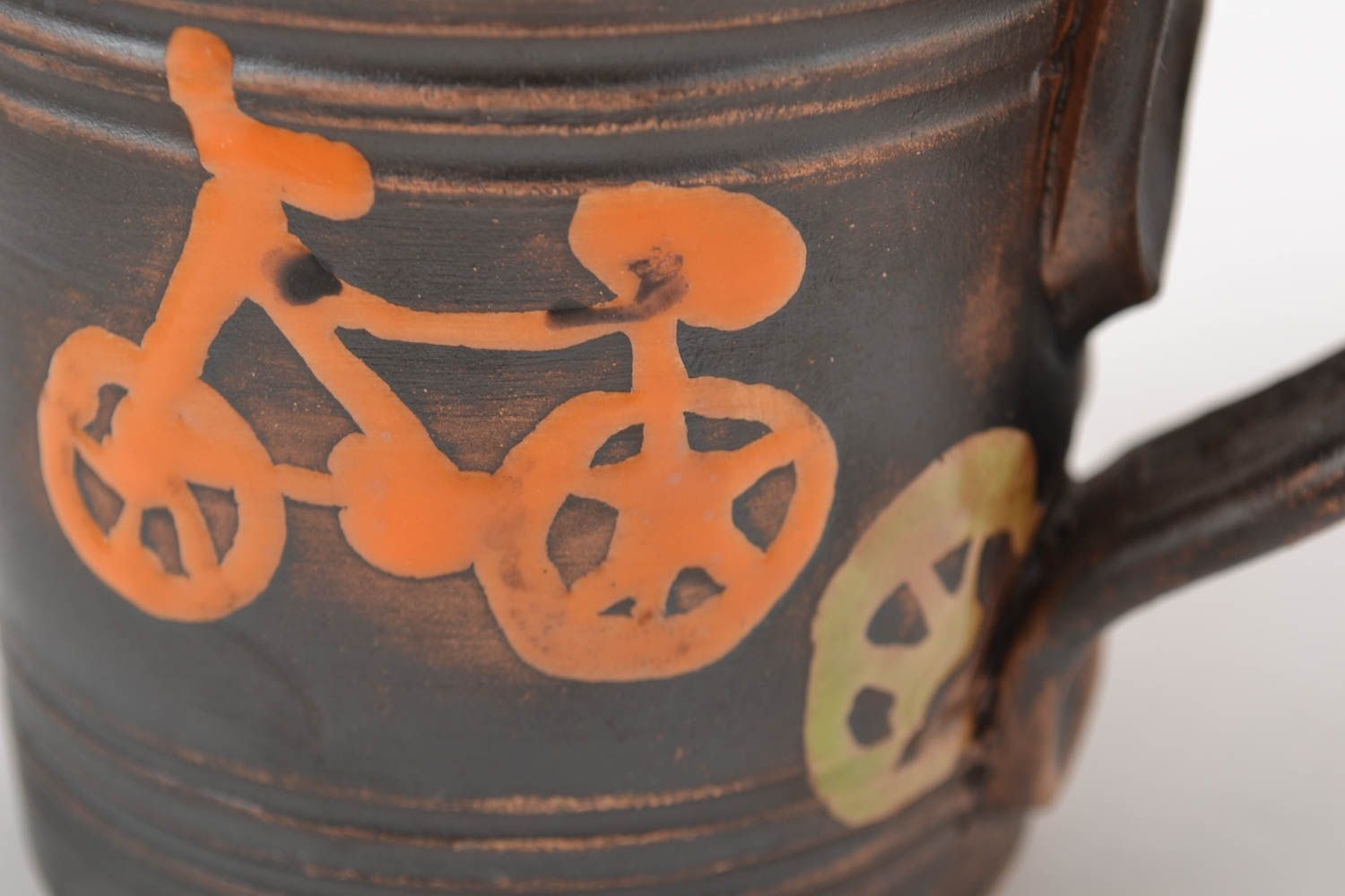 8 oz brown and orange ceramic coffee cup with bicycle patter and handle photo 5