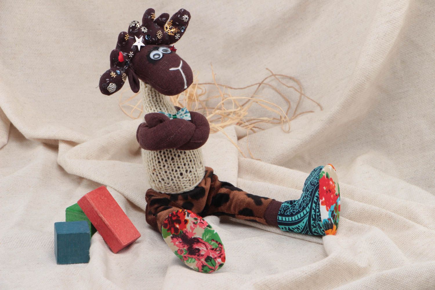Handmade designer fabric soft toy Elk in knit vest and trousers with animal print photo 1