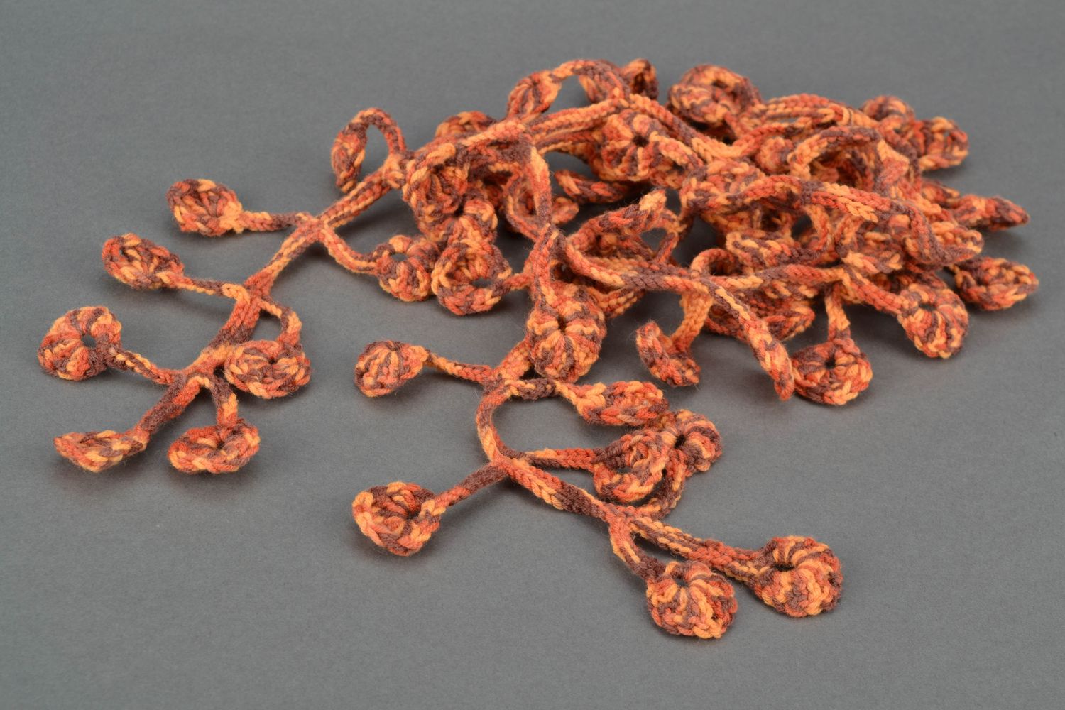 Lacy crochet scarf of orange color photo 2