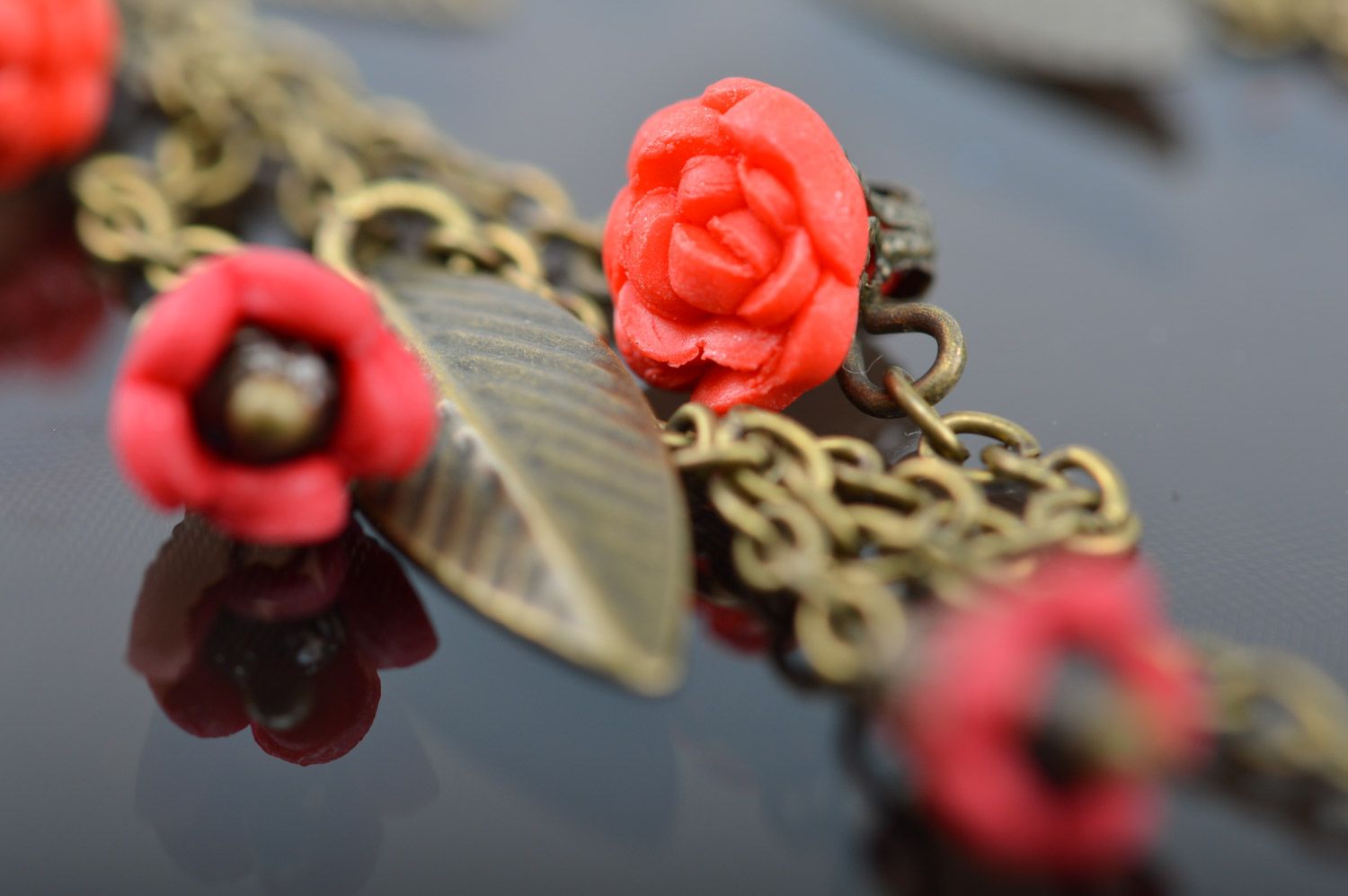 Handmade long earrings with metal chains and leaves and small polymer clay roses photo 4