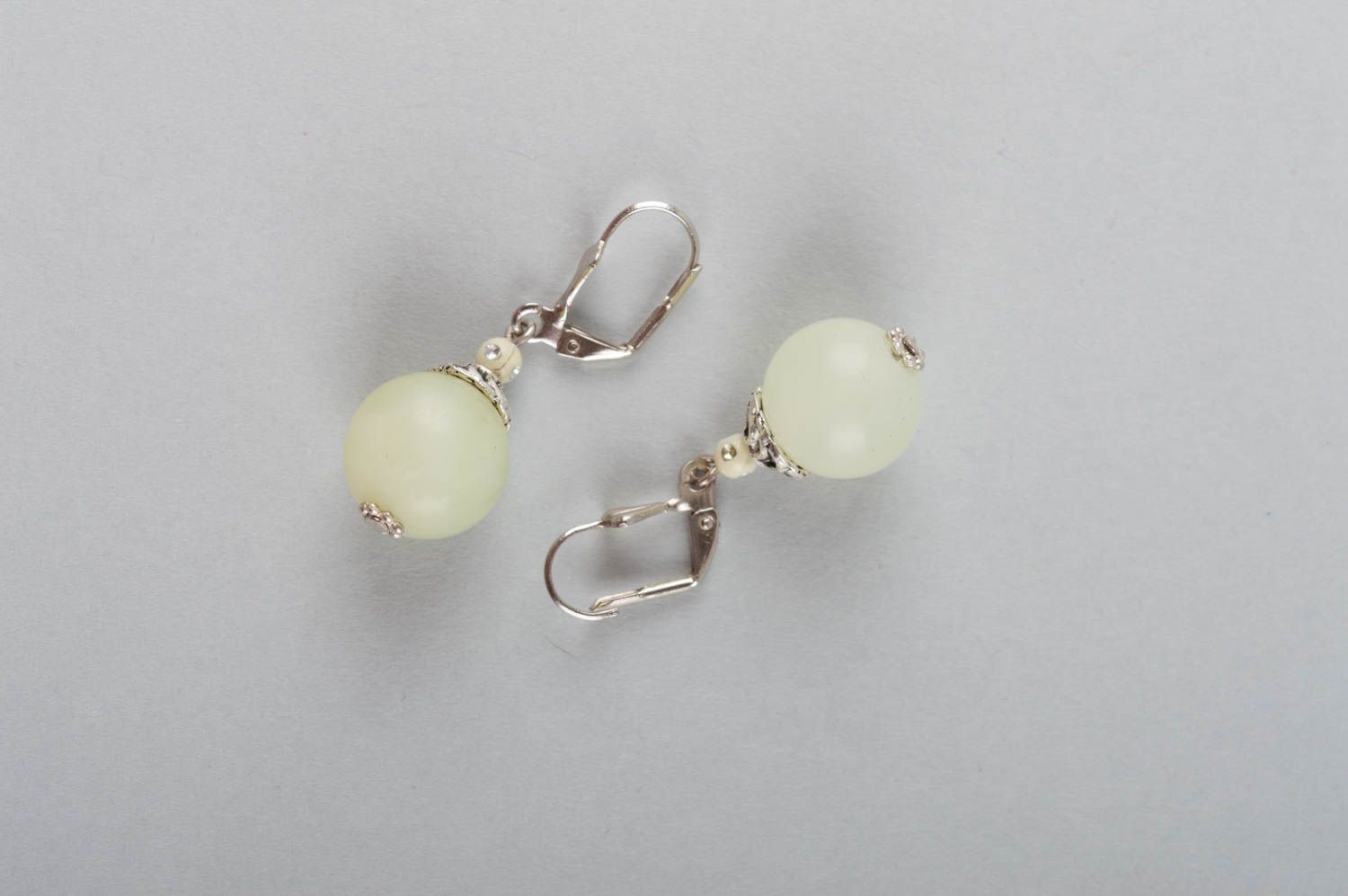 Beautiful handmade elegant brass earrings with natural nephrite stone white photo 2
