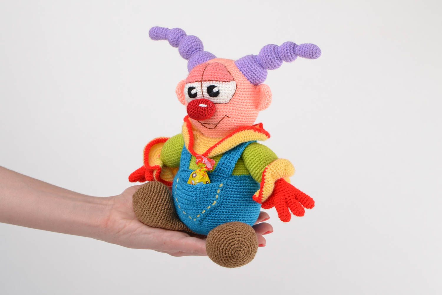 Handmade designer soft toy crocheted of acrylic threads colorful bright clown photo 2