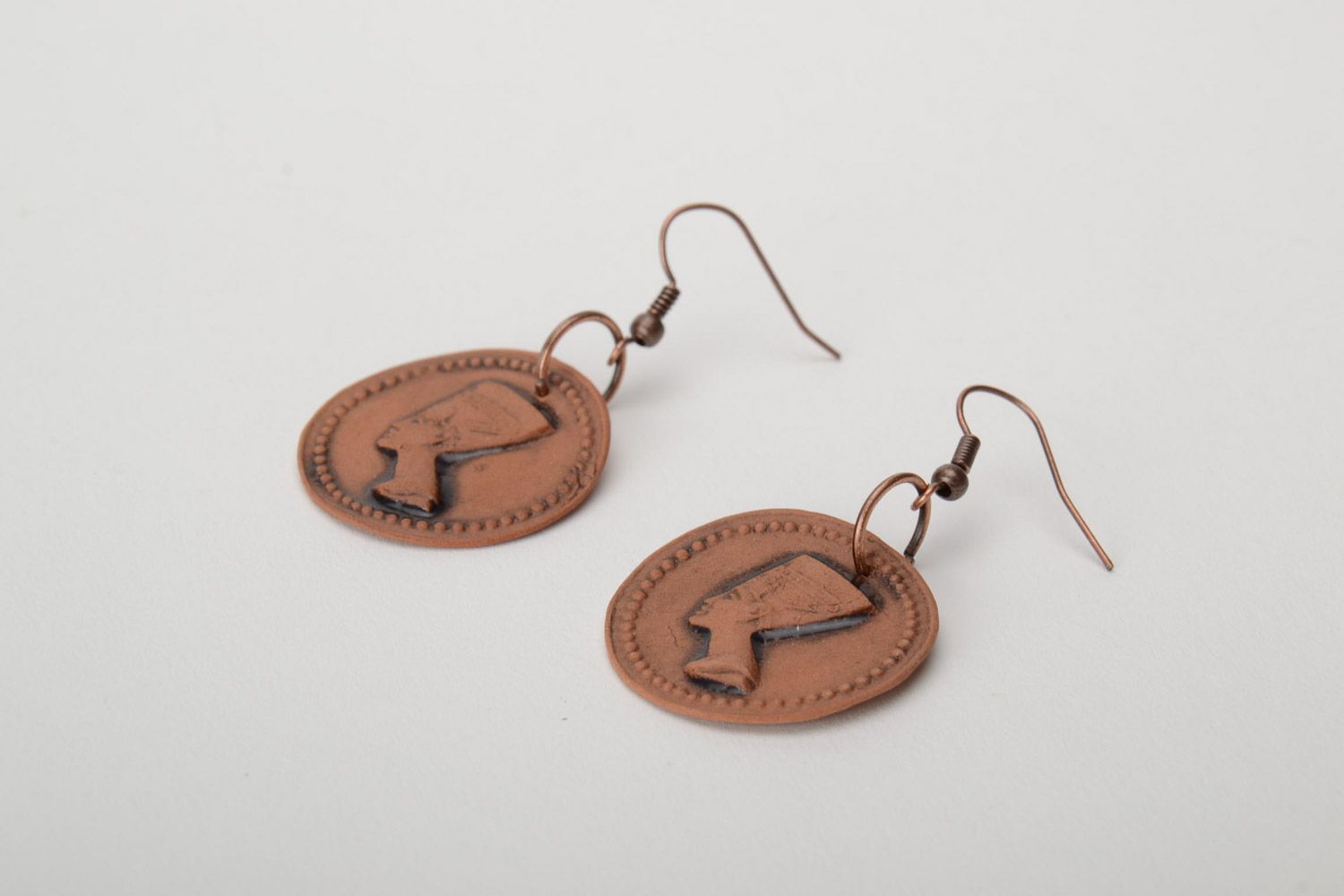 Women's round earrings hand made of brown clay with the image of Nefertiti photo 5